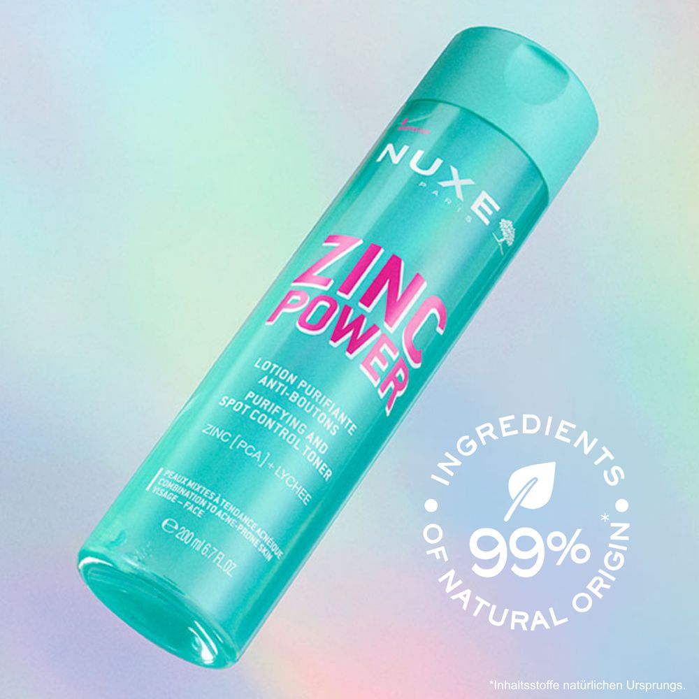 Flacon turquoise avec inscription ZINC POWER. Texte : 99% d'origine naturelle. Logo NUXE.