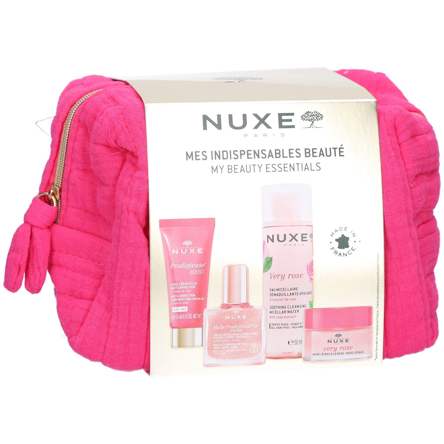 Pinkfarbene Kosmetiktasche mit NUXE-Produkten. Goldfarbene Verpackung mit Schriftzug. Produkte: Creme, Serum, Mizellenwasser.