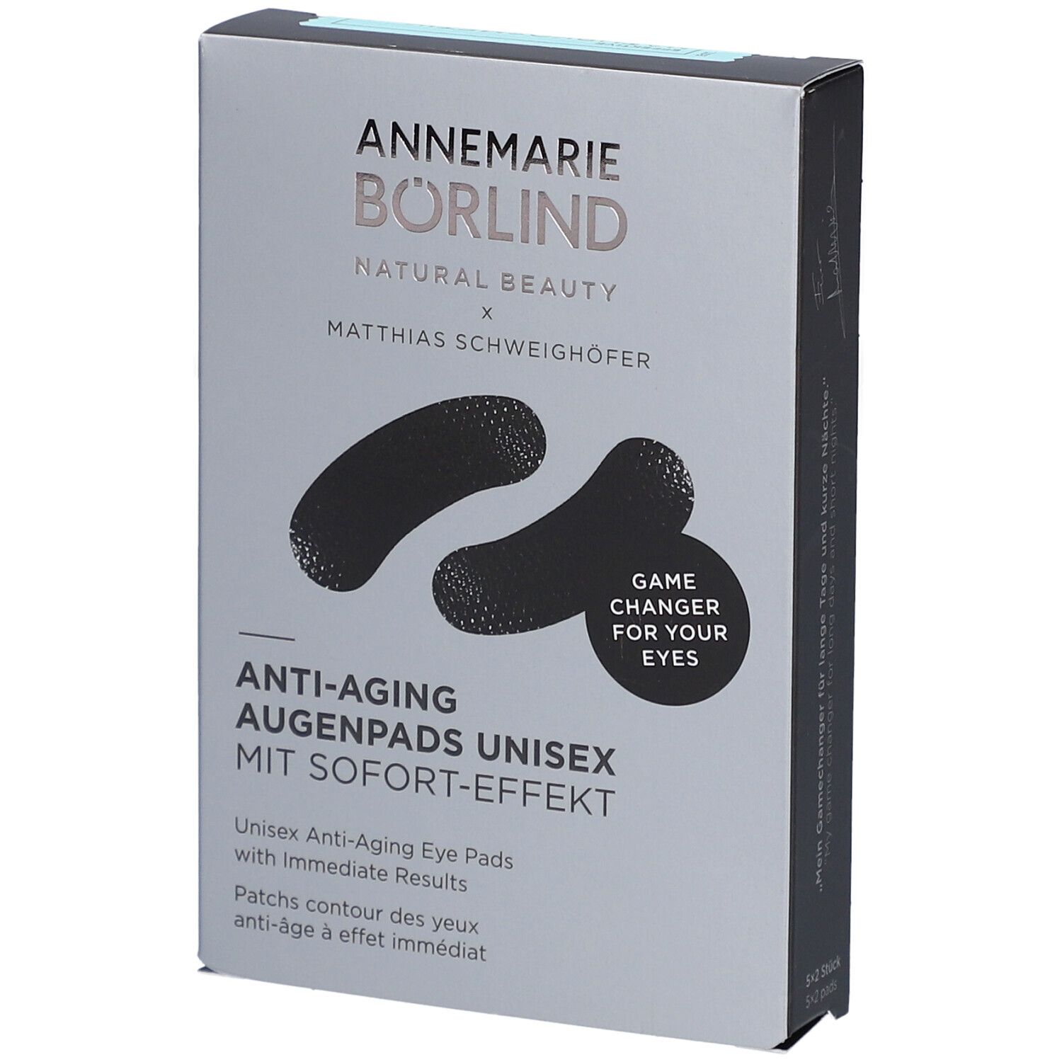Boîte grise avec patchs noirs pour les yeux. Inscription: ANNEMARIE BÖRLIND, Anti-Aging Augenpads Unisex. Avec effet immédiat. Game Changer for your eyes.