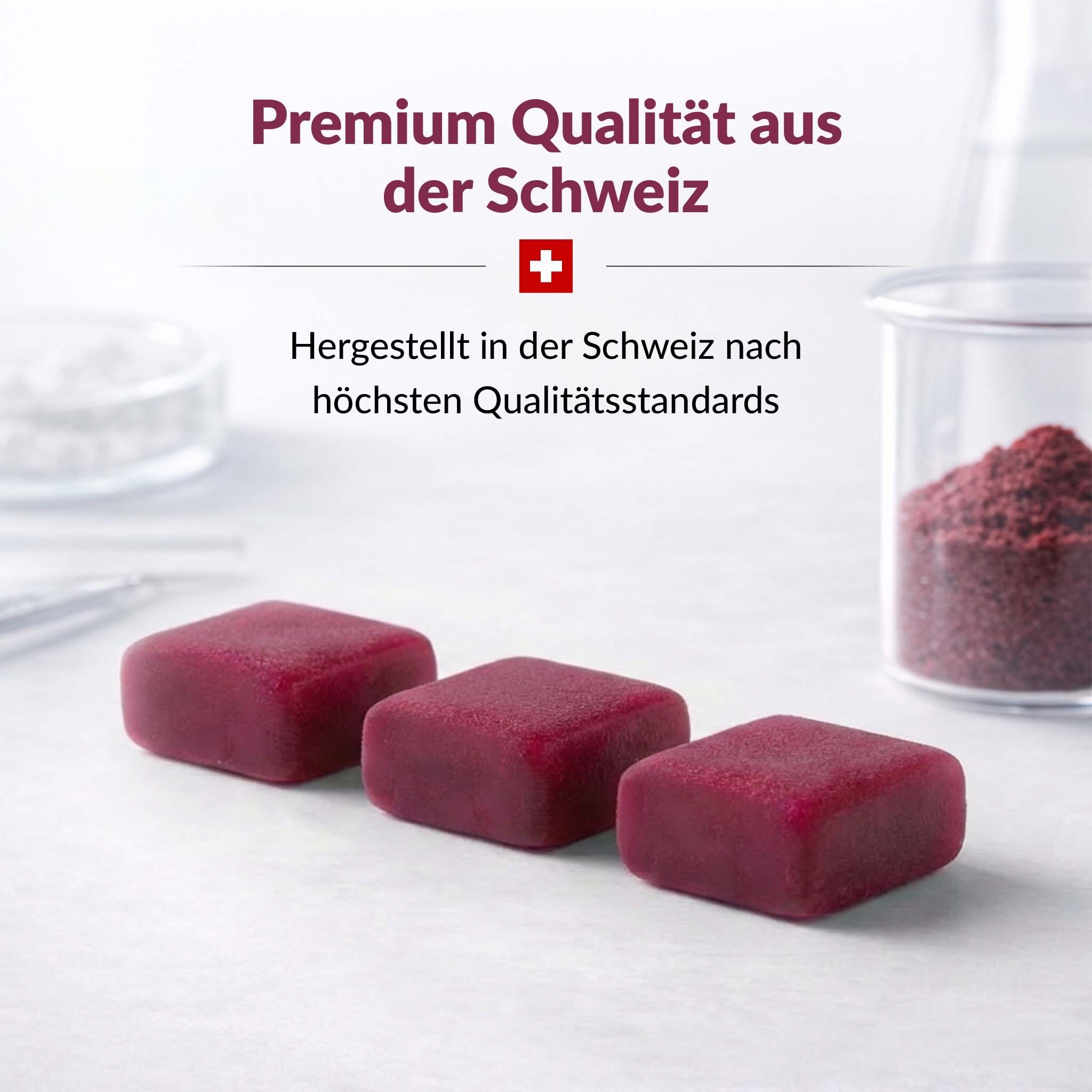 Trois cubes rouges sur fond blanc. Texte : Qualité premium de Suisse. Croix suisse.
