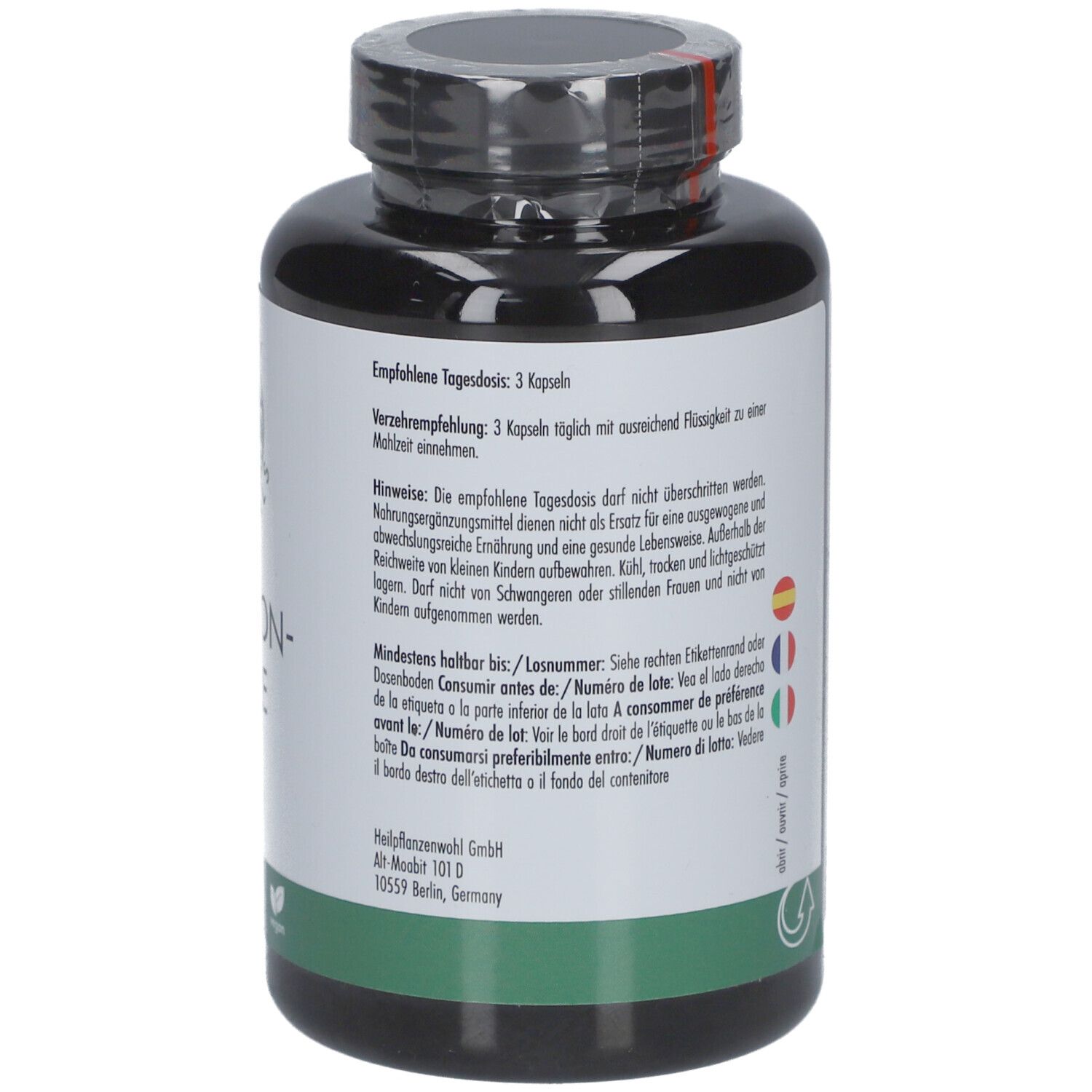 Dos du flacon noir. Étiquette avec recommandations et avertissements. Texte en allemand.