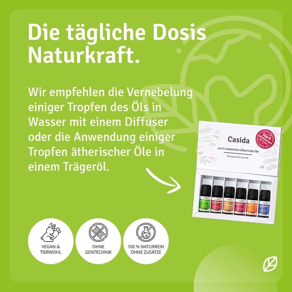 Weiße Schachtel mit sechs Fläschchen ätherischer Öle. Text: "Vegan & Tierwohl", "Ohne Gentechnik", "100 % naturreine Öle ohne Zusätze".