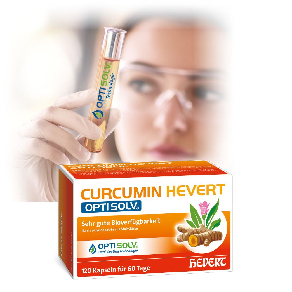 Produktverpackung Curcumin Hevert Optisolv. Frau mit Schutzbrille hält Reagenzglas. Produktname, Logo, Kurkuma-Abbildung.