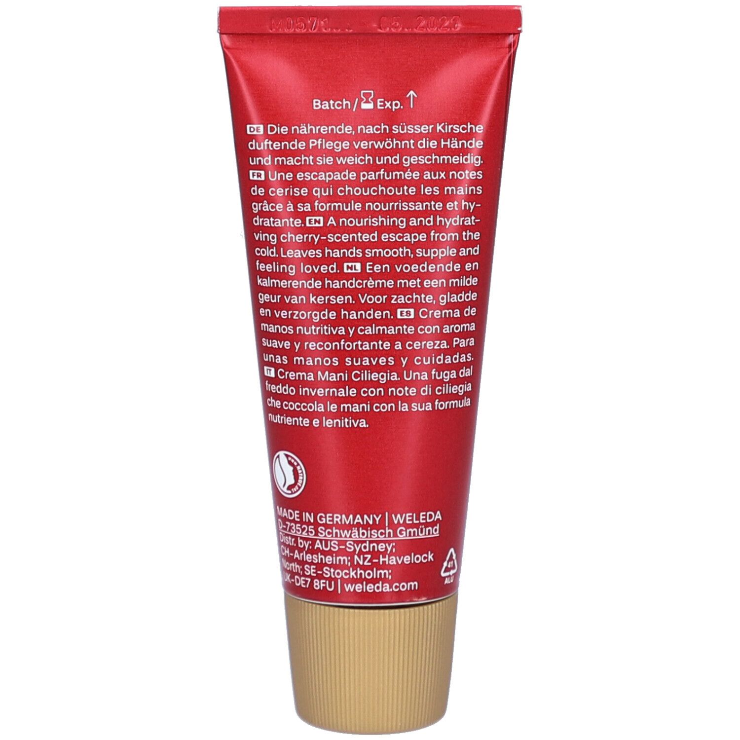 Rückseite der Tube. Text in mehreren Sprachen. Goldfarbener Verschluss. Chargen- und Verfallsdatum.