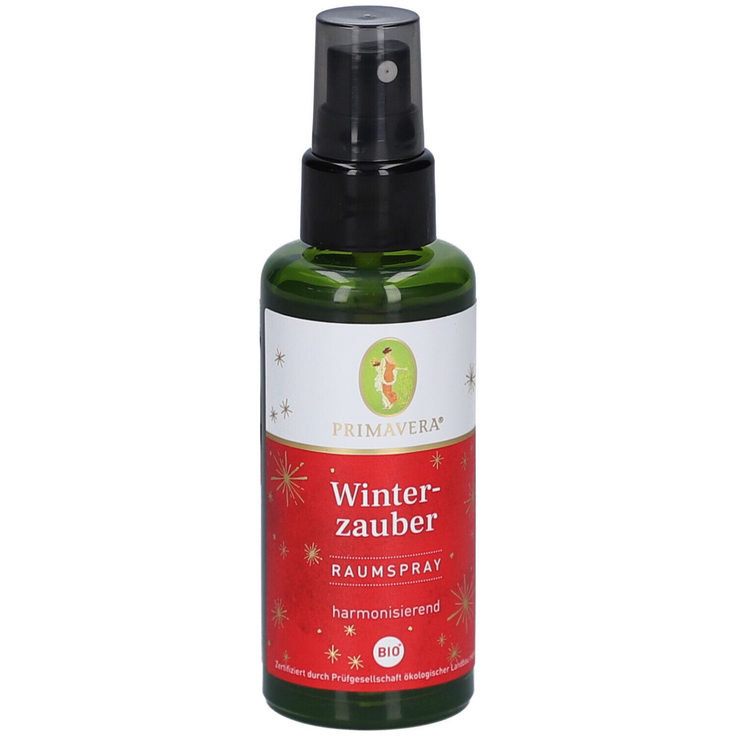 Flacon en verre vert avec vaporisateur noir. Étiquette Primavera, Winterzauber Raumspray, label BIO. Étoiles et détails dorés.