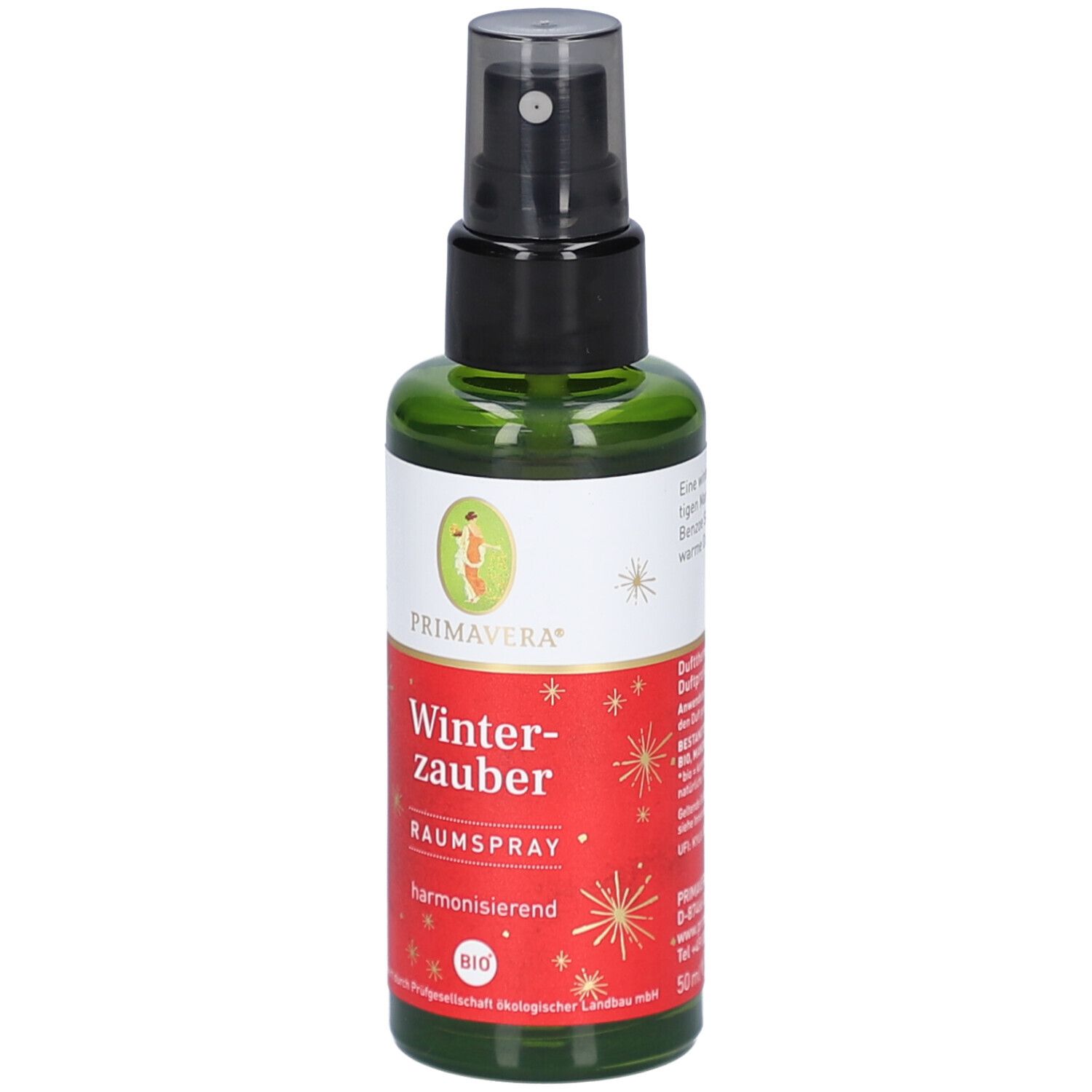 Flacon en verre vert avec vaporisateur noir. Étiquette Primavera, Winterzauber Raumspray, label BIO. Étoiles et détails dorés. 50ml.