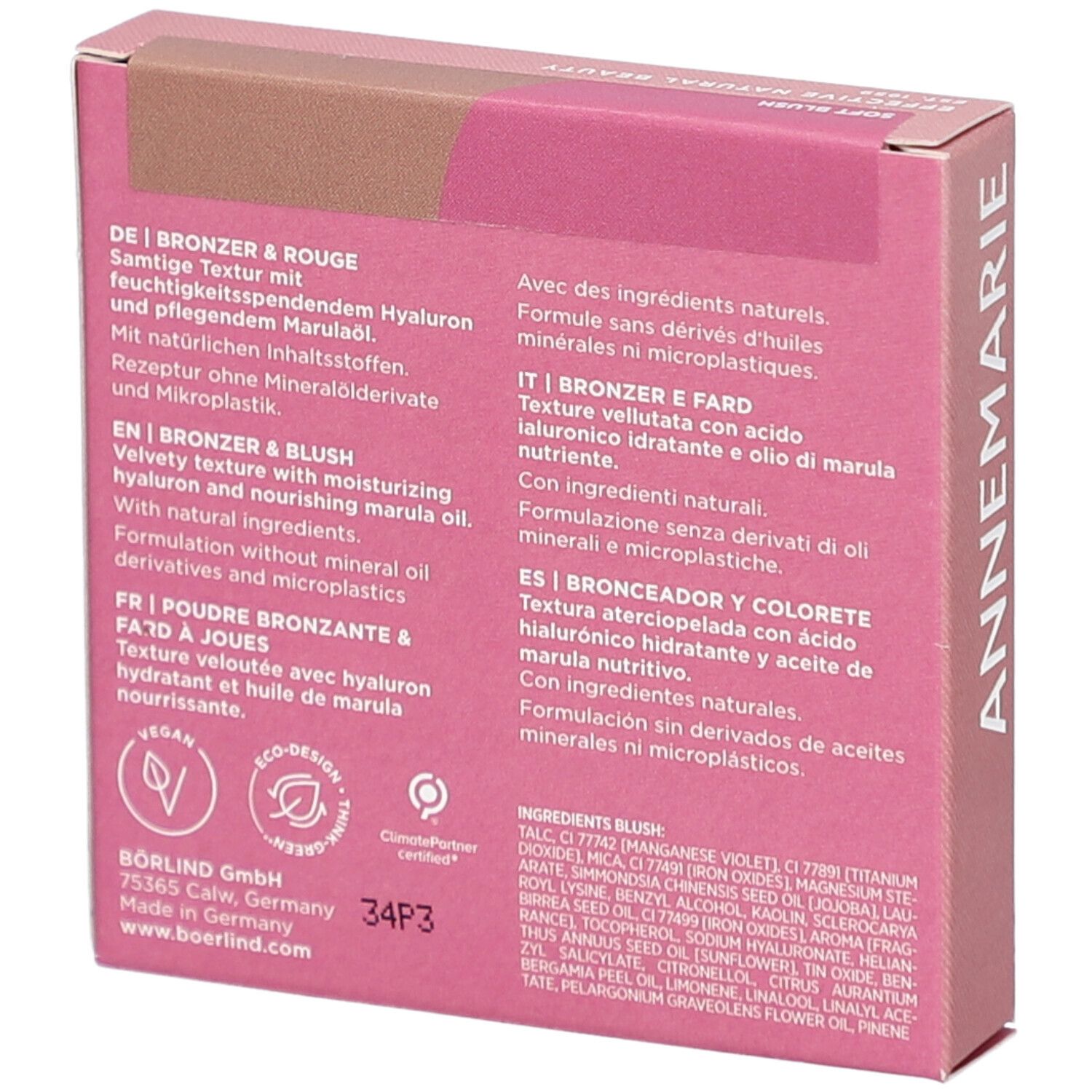 Rückseite der rosa-braunen Kartonverpackung. Text in Deutsch, Englisch, Französisch und Italienisch. Inhaltsstoffe und Logos.