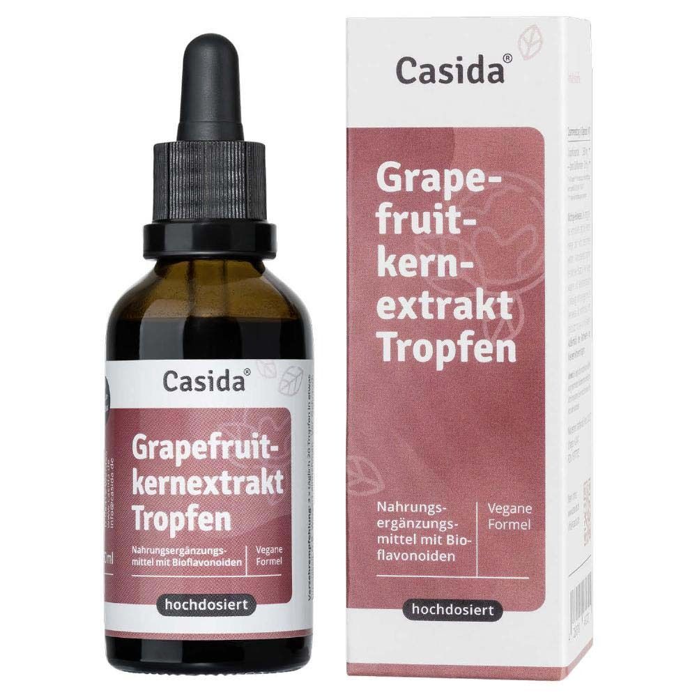 Braune Glasflasche mit Tropfer und weißem Etikett. Text: Casida, Grapefruitkernextrakt Tropfen. Mit Verpackung.