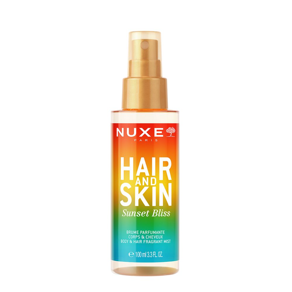 NUXE® Hair and Skin Sunset Bliss Duftspray. Farbverlauf von Orange zu Grün. Sprühkopf. Text: Hair and Skin, Sunset Bliss.