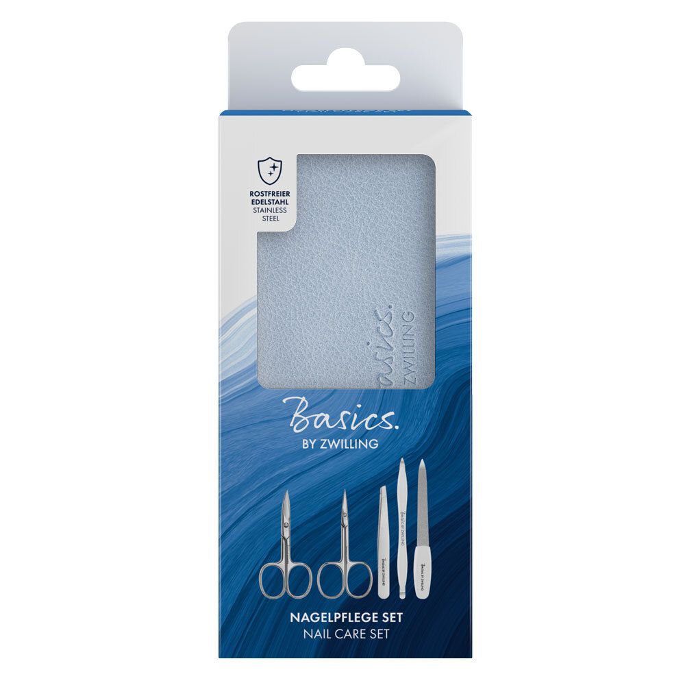 Set de manucure dans son emballage. Contient ciseaux, lime et autres instruments. Marque : Basics by Zwilling.
