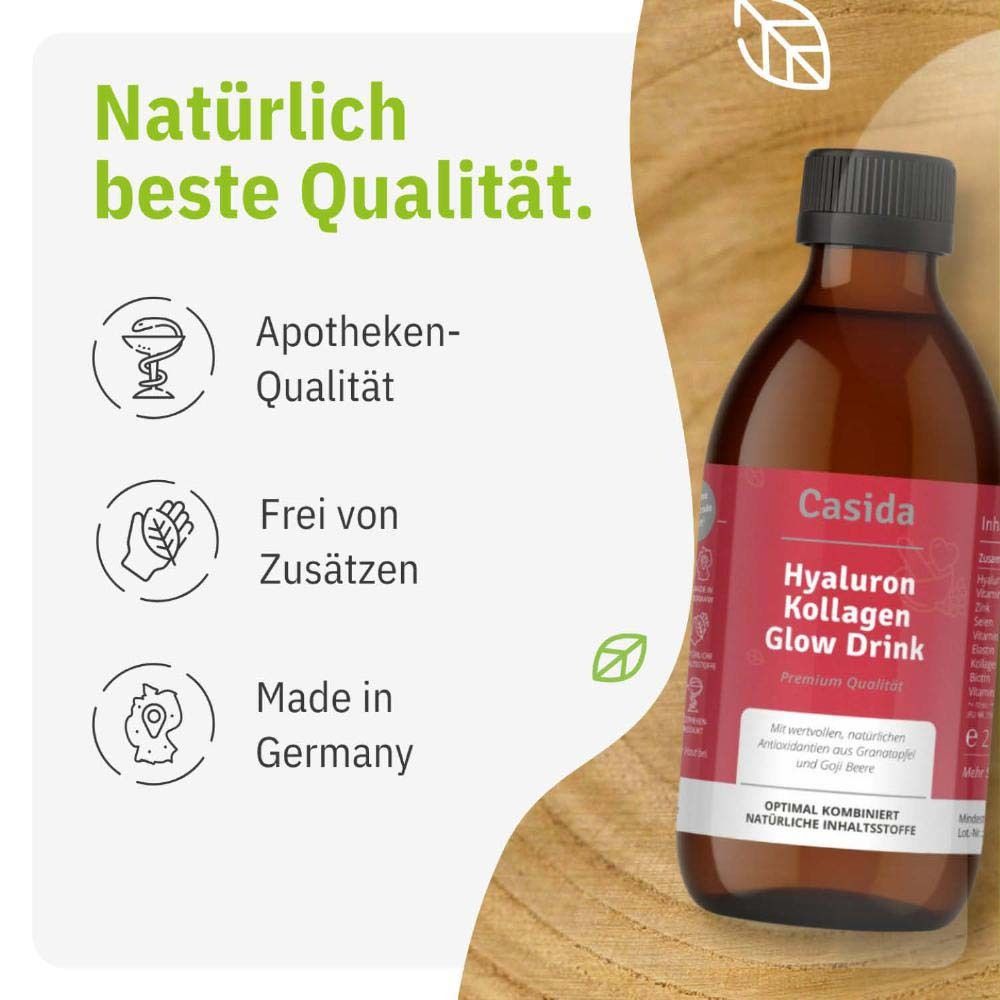 Bouteille en verre avec étiquette. Qualité pharmacie, sans additifs, Fabriqué en Allemagne. Fond: bois.
