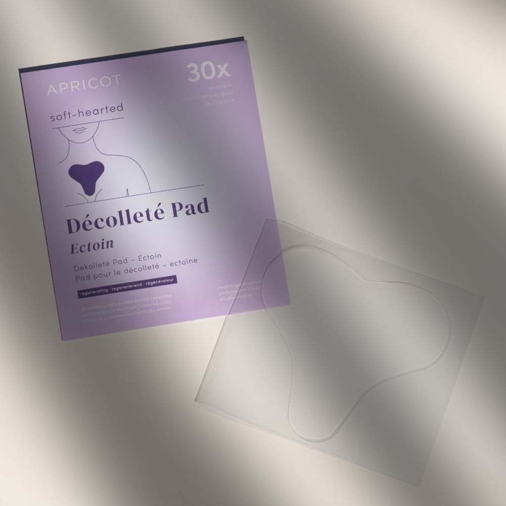 Emballage et pad Décolleté transparent. Inscription : APRICOT, Décolleté Pad, Ectoïne.