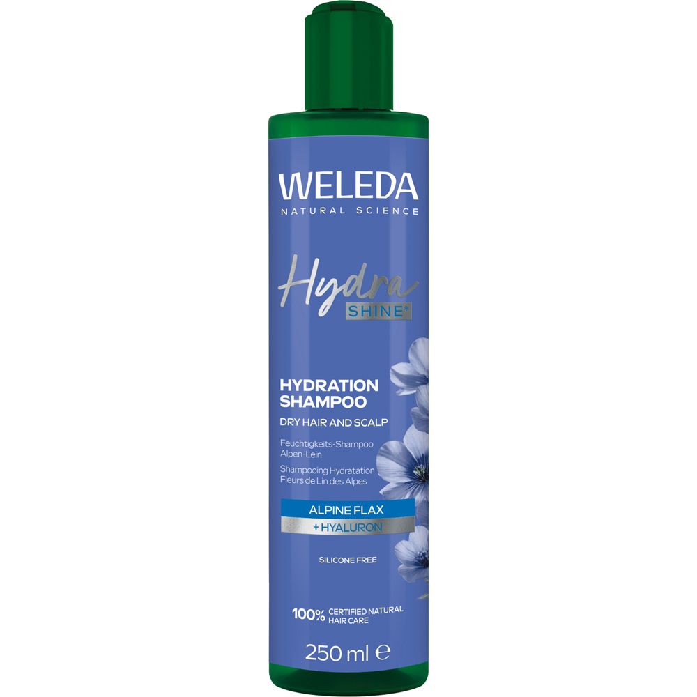 Shampoo Weleda Hydra Shine. Bouteille avec bouchon vert. Étiquette bleue avec informations et fleurs. 250 ml.