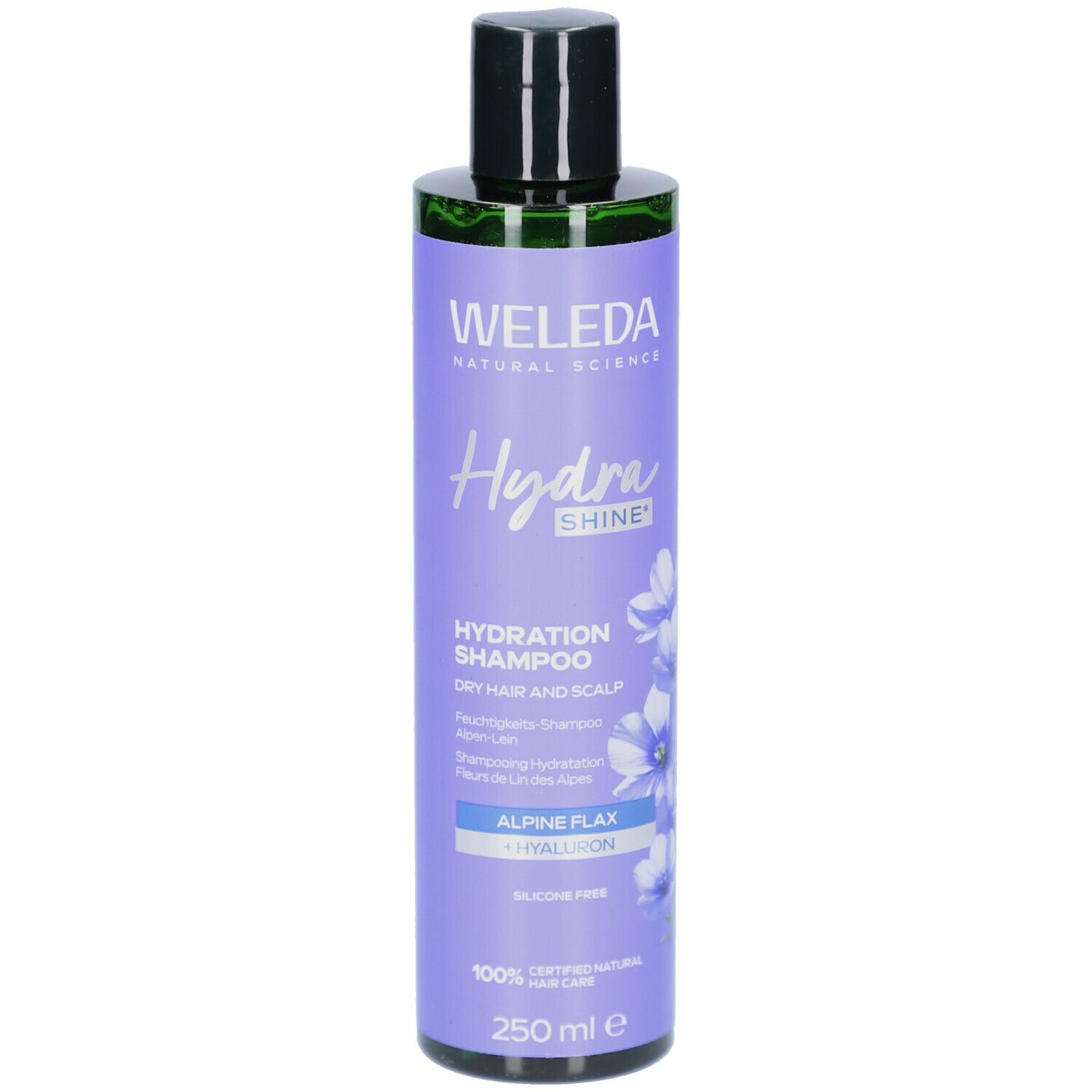 Flasche WELEDA HydraShine Shampoo. Lila Etikett mit Produktnamen, Blüten und Text. Schwarzer Deckel.