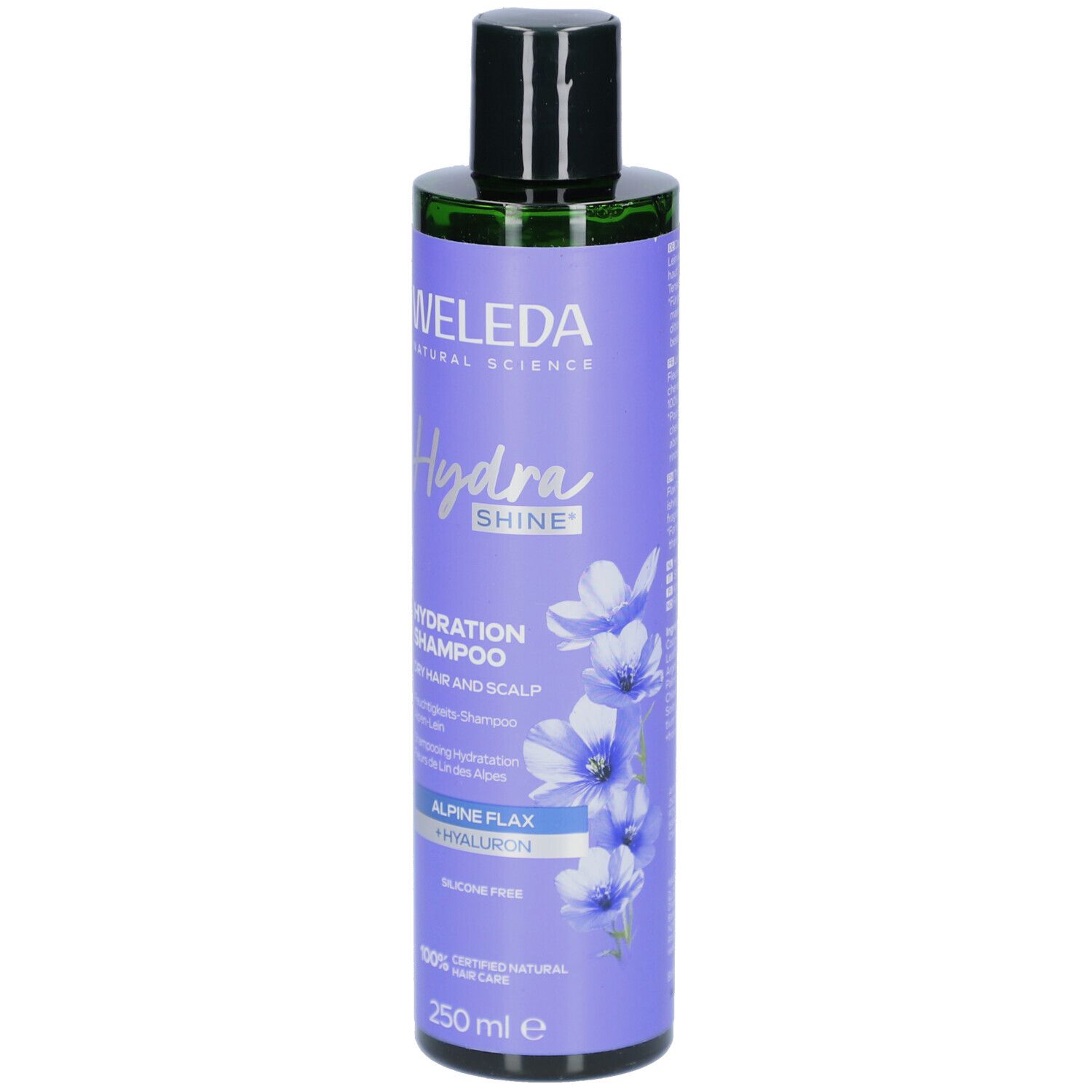 Flasche WELEDA HydraShine Shampoo. Lila Etikett mit Produktnamen, Blüten und Text. Schwarzer Deckel.