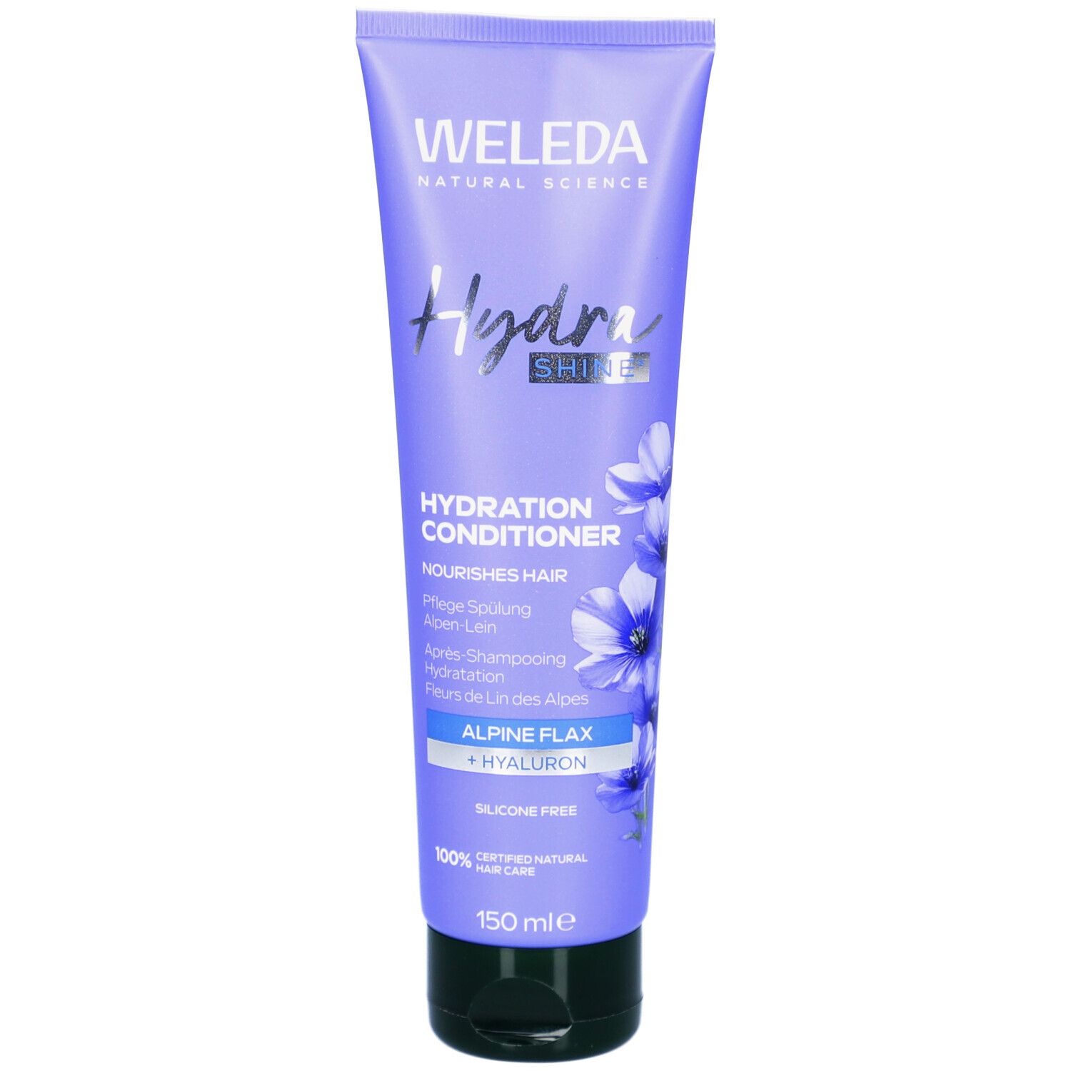 Tube violet Weleda HydraShine. Nom du produit et illustrations florales. Texte: Hydration Conditioner, Alpine Flax + Hyaluron.
