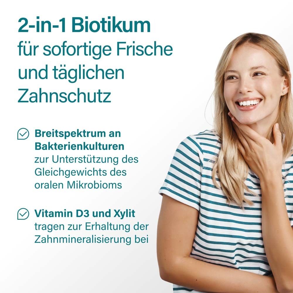 Frau lächelt, Zähne gepflegt. Text über 2-in-1 Biotikum für Frische und Zahnschutz.