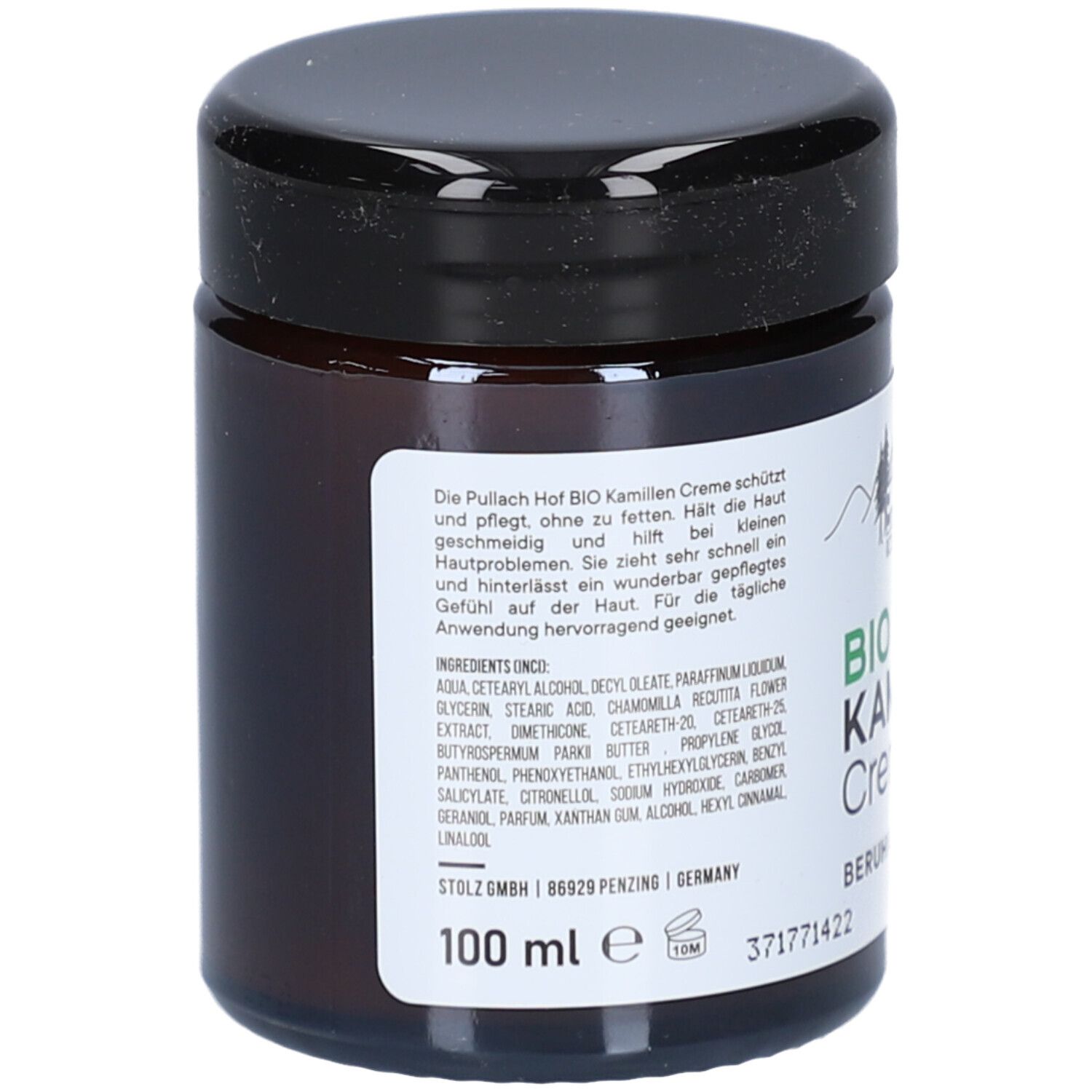 Braune Glasdose mit schwarzem Deckel. Etikett mit Produktinformationen und Aufschrift: BIO Kamillen Creme. 100 ml.