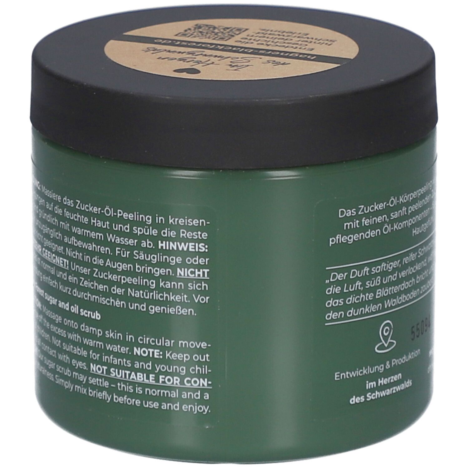 Pot vert avec texte. Texte: Zucker-Öl-Peeling, application, attention: Ne pas mettre dans les yeux. Ne convient pas aux nourrissons.