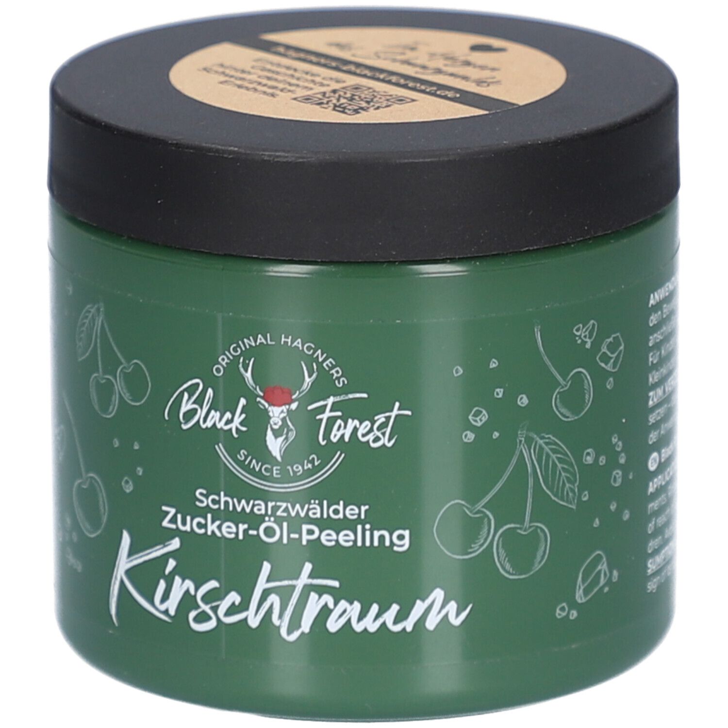Pot vert avec couvercle noir. Inscription: Original Hagners Black Forest, Schwarzwälder Zucker-Öl-Peeling Kirschtraum. Illustrations de cerises.