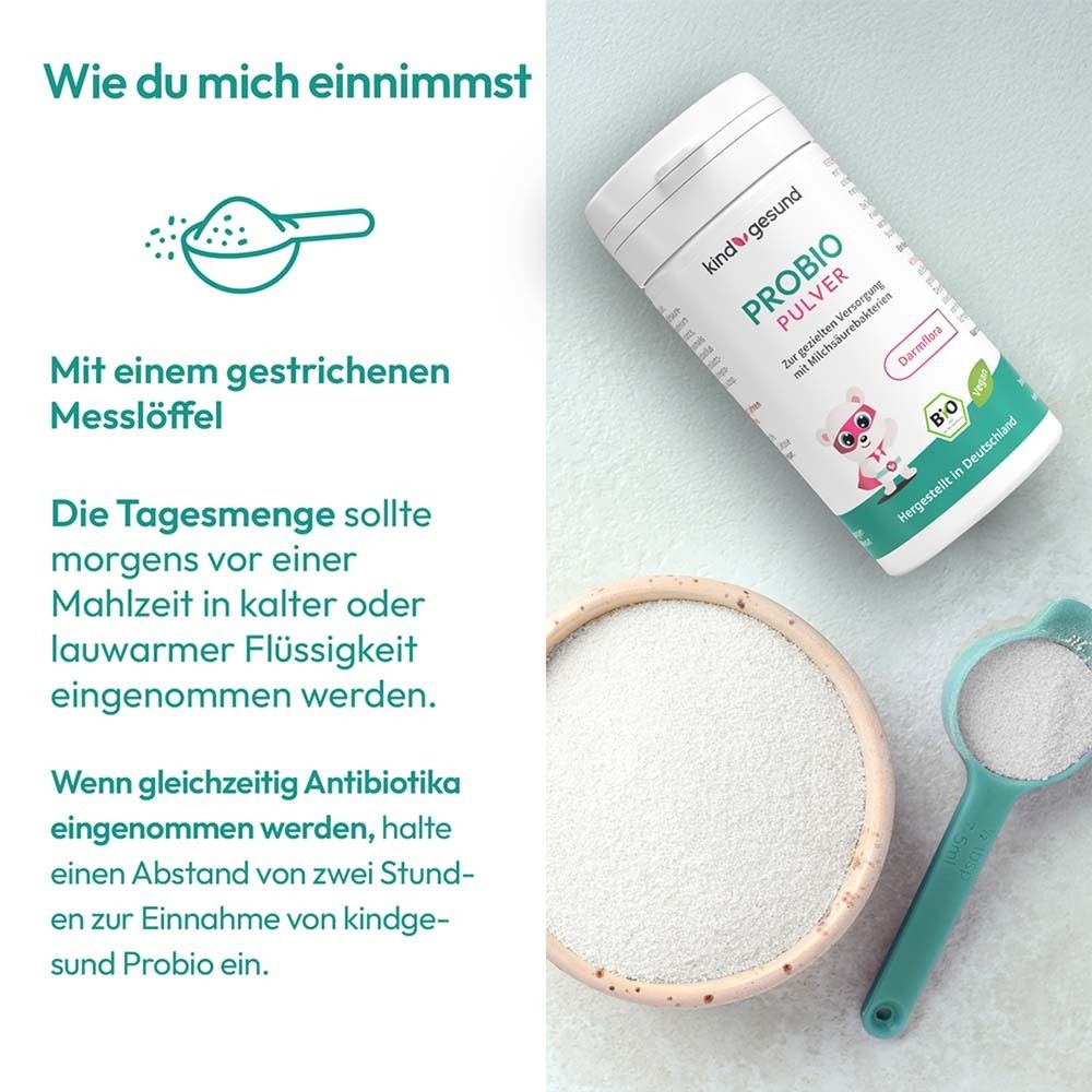 Produkt und Messlöffel. Text: Mit einem gestrichenen Messlöffel. Tagesmenge morgens vor Mahlzeit in kalter oder warmer Flüssigkeit einnehmen.