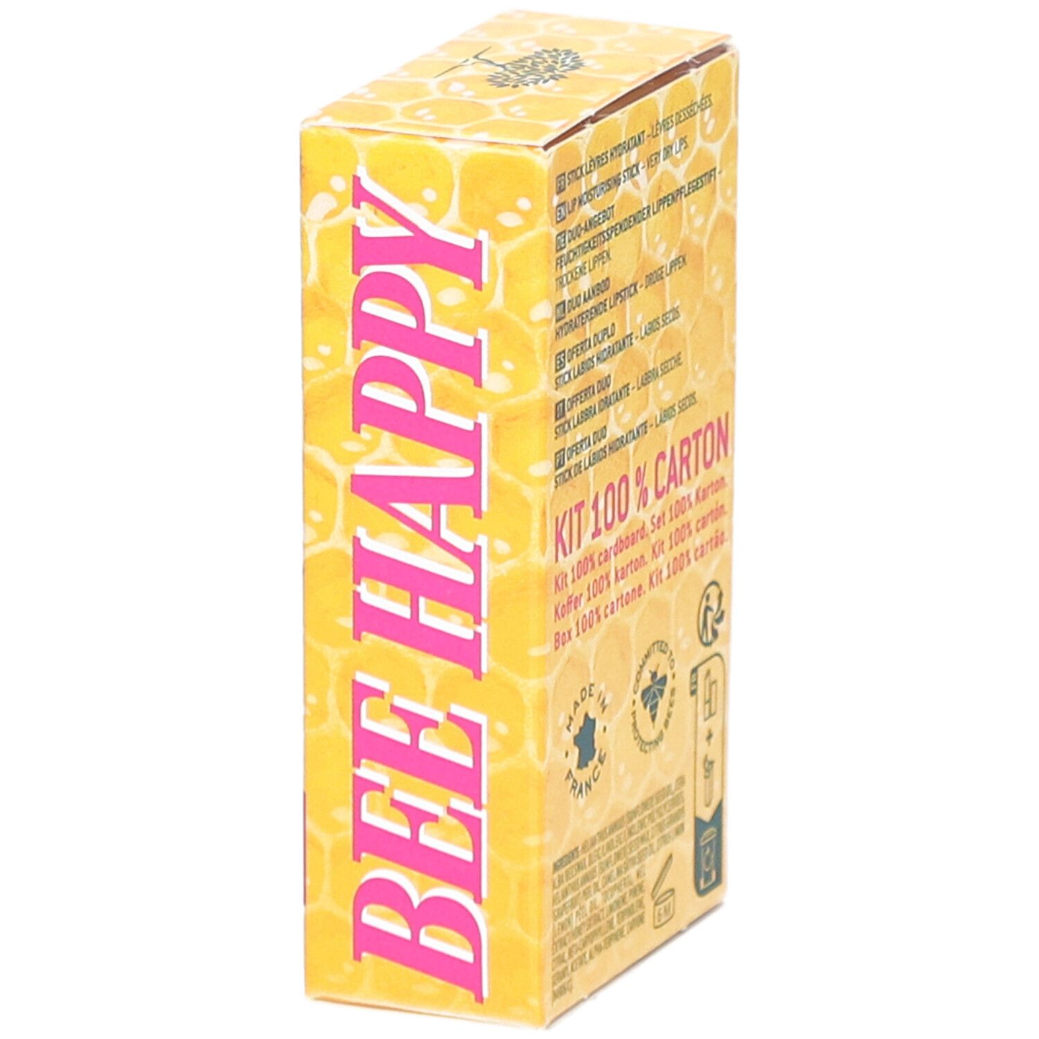 Emballage en carton de NUXE. Motif nid d'abeilles. Texte: Bee Happy. Kit 100% Carton. Vue latérale.