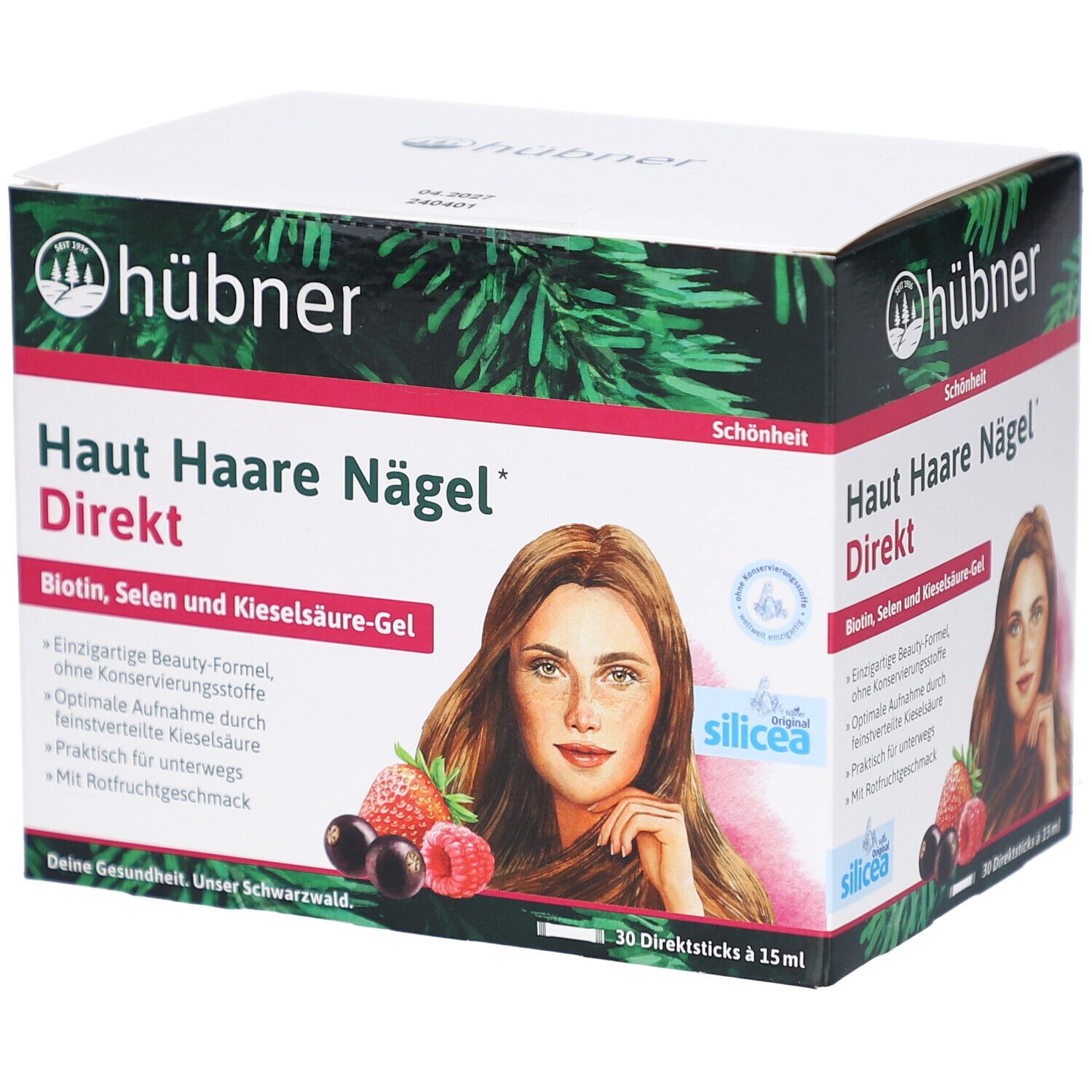 Boîte avec impression du produit. Contient : Haut Haare Nägel Direkt. Illustration d'une femme, fruits. Marque : Hübner.
