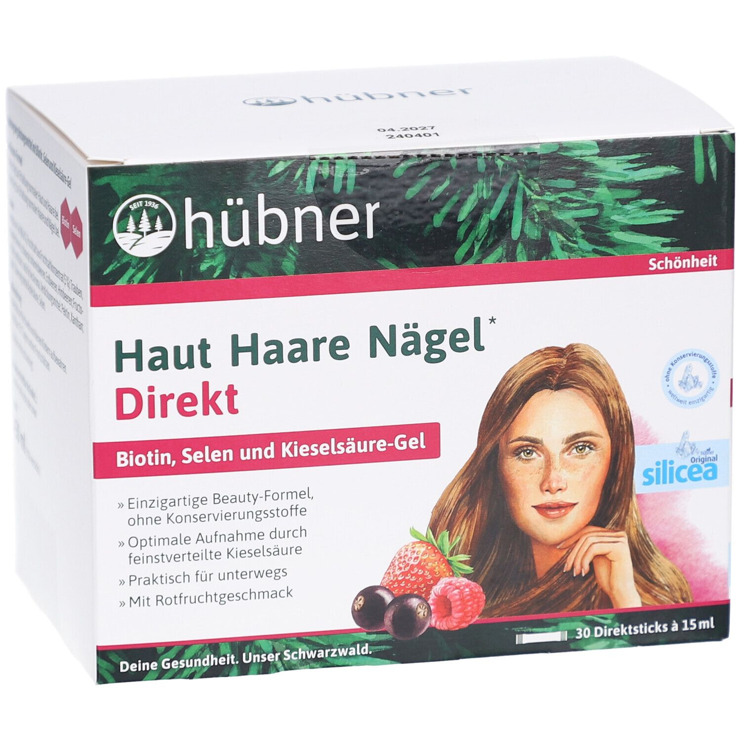 Boîte avec impression du produit. Contient : Haut Haare Nägel Direkt. Illustration d'une femme, fruits. Marque : Hübner.