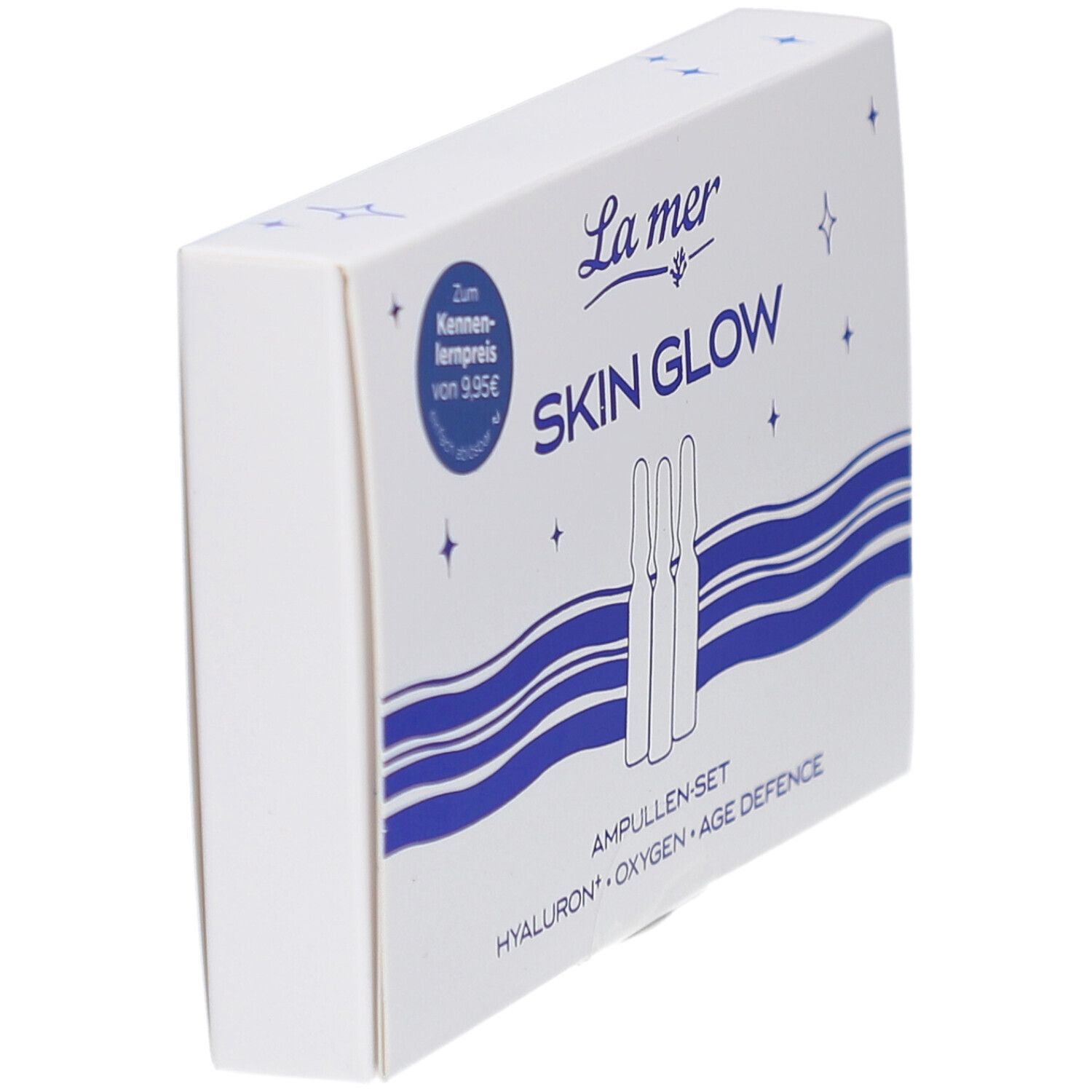 Schachtel La mer Skin Glow Ampullen-Set, weiß. Blaue Wellen und Sterne. Aufdruck: Hyaluron, Oxygen, Age Defence.