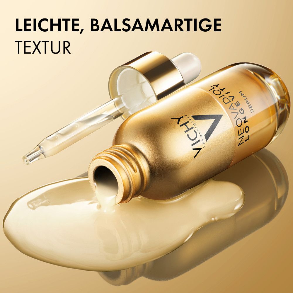 Goldene Vichy Flasche mit Pipette, Serum tropft heraus. Leichte, balsamartige Textur.