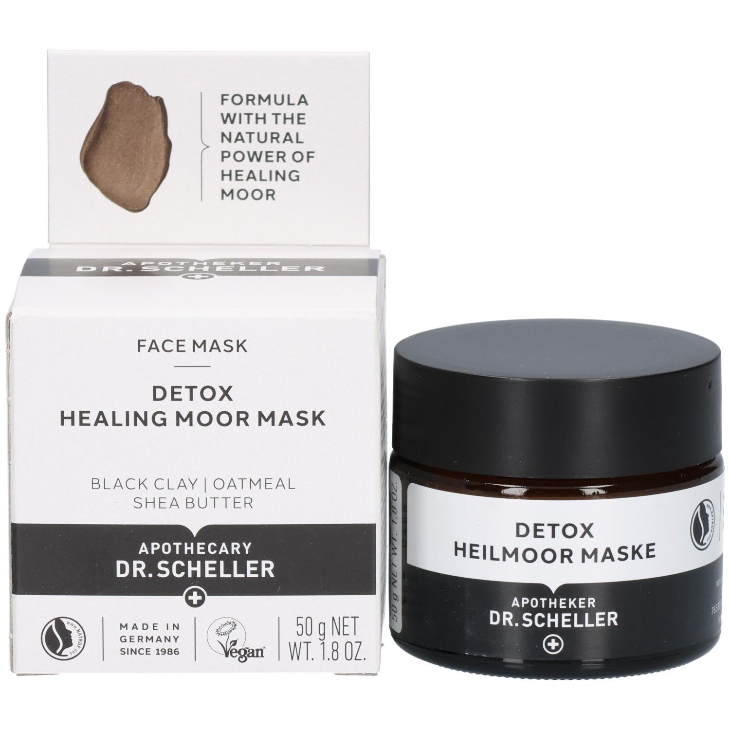 Verpackung und Glasgefäß: "FACE MASK", "DETOX HEALING MOOR MASK", "DR. SCHELLER", "50 g NET WT. 1.8 OZ.".