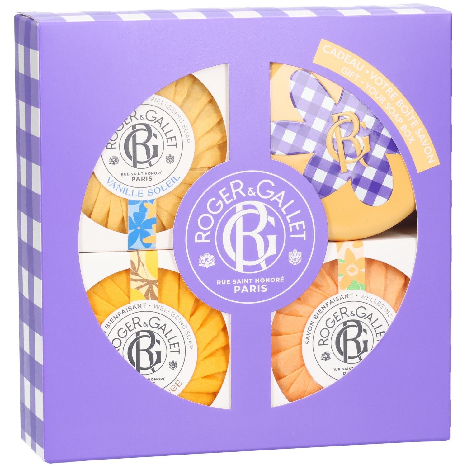 Roger & Gallet Seifen-Set in violetter Geschenkbox mit vier runden Seifen in Gelb- und Orangetönen.