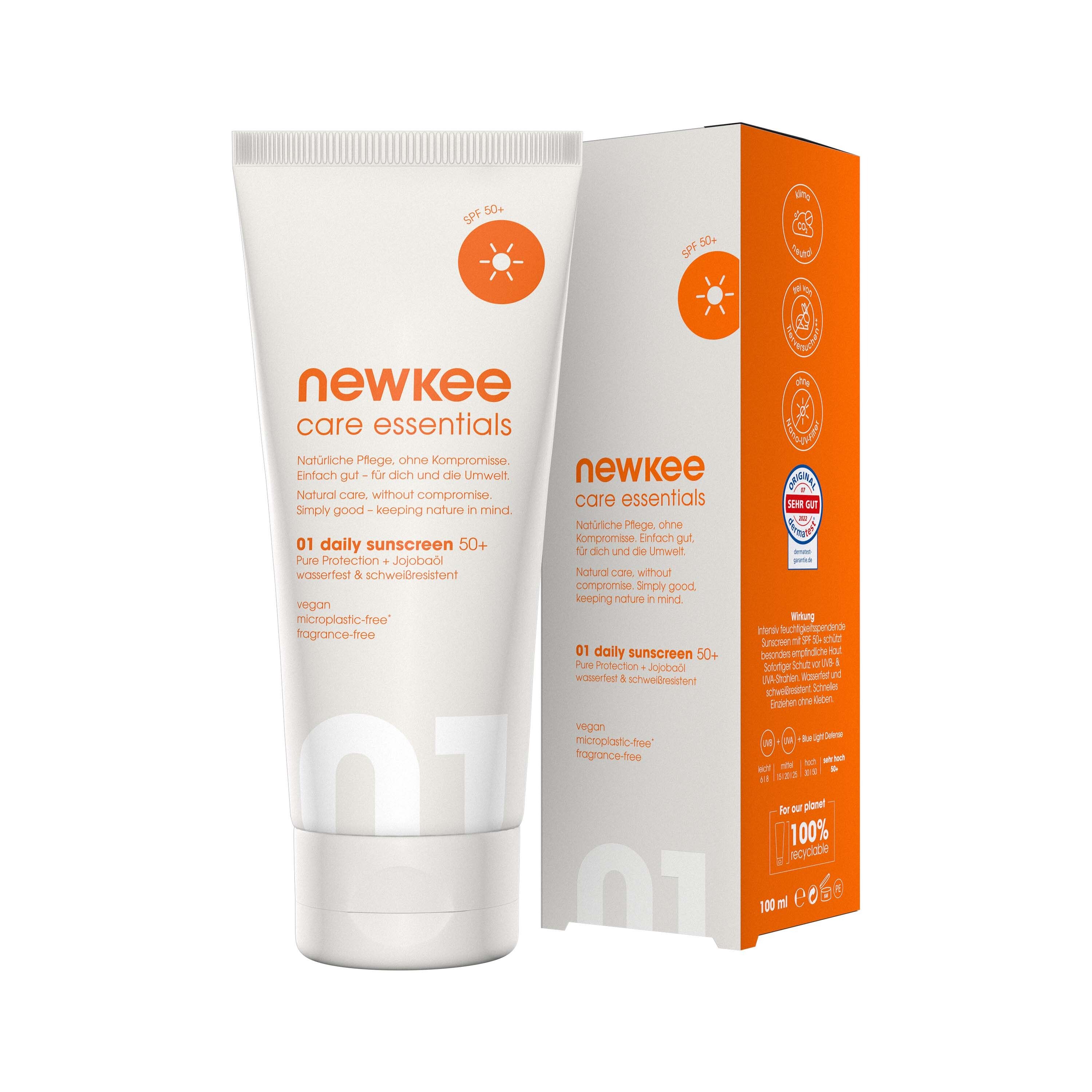 Newkee Care Essentials 01 Daily Sunscreen 50+ Tube und Faltschachtel. Mit Sonnenschutz-Symbol.