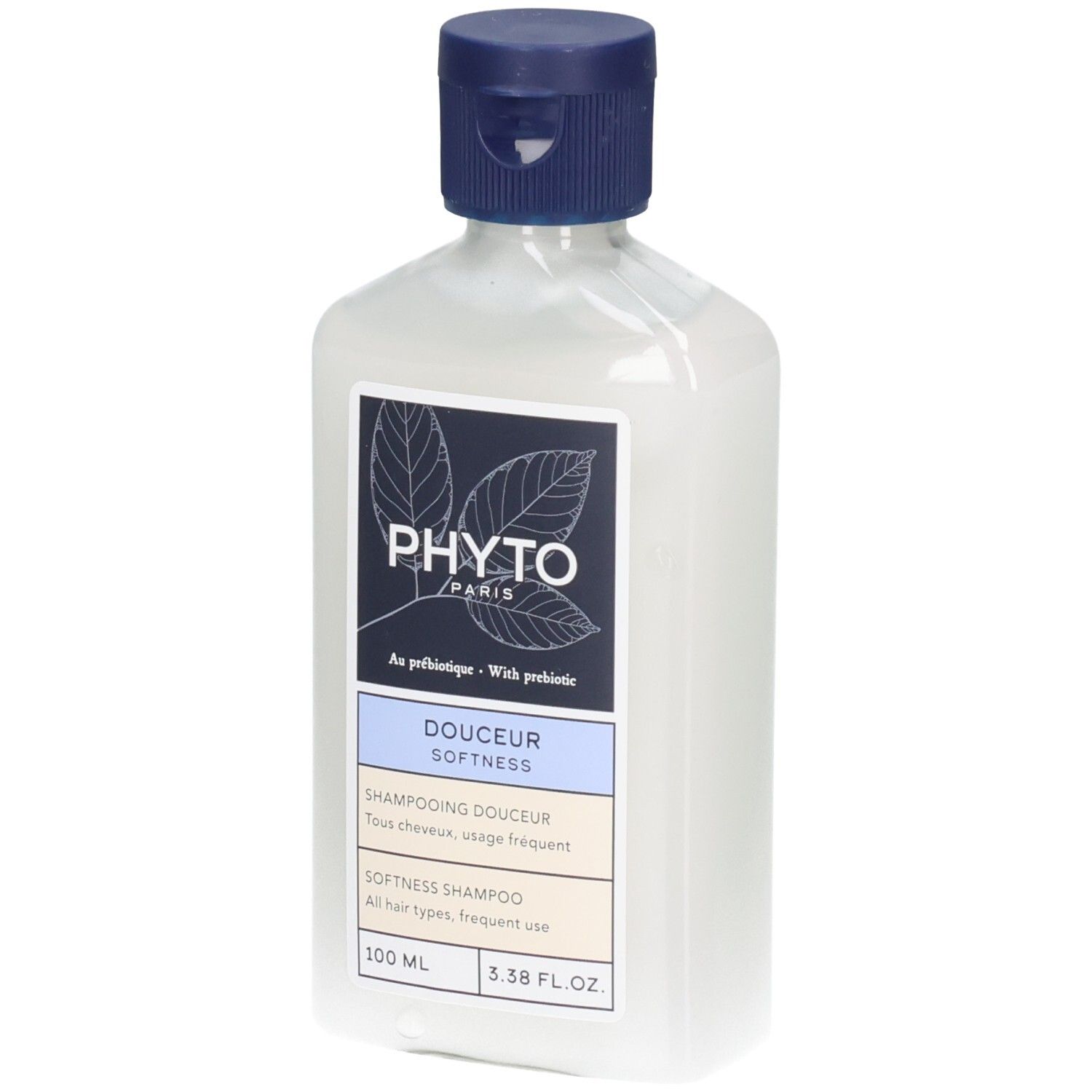 Phyto Softness Shampoo Flasche mit blauem Klappdeckel. Klare Flasche mit weißem Etikett und Blattmotiv.