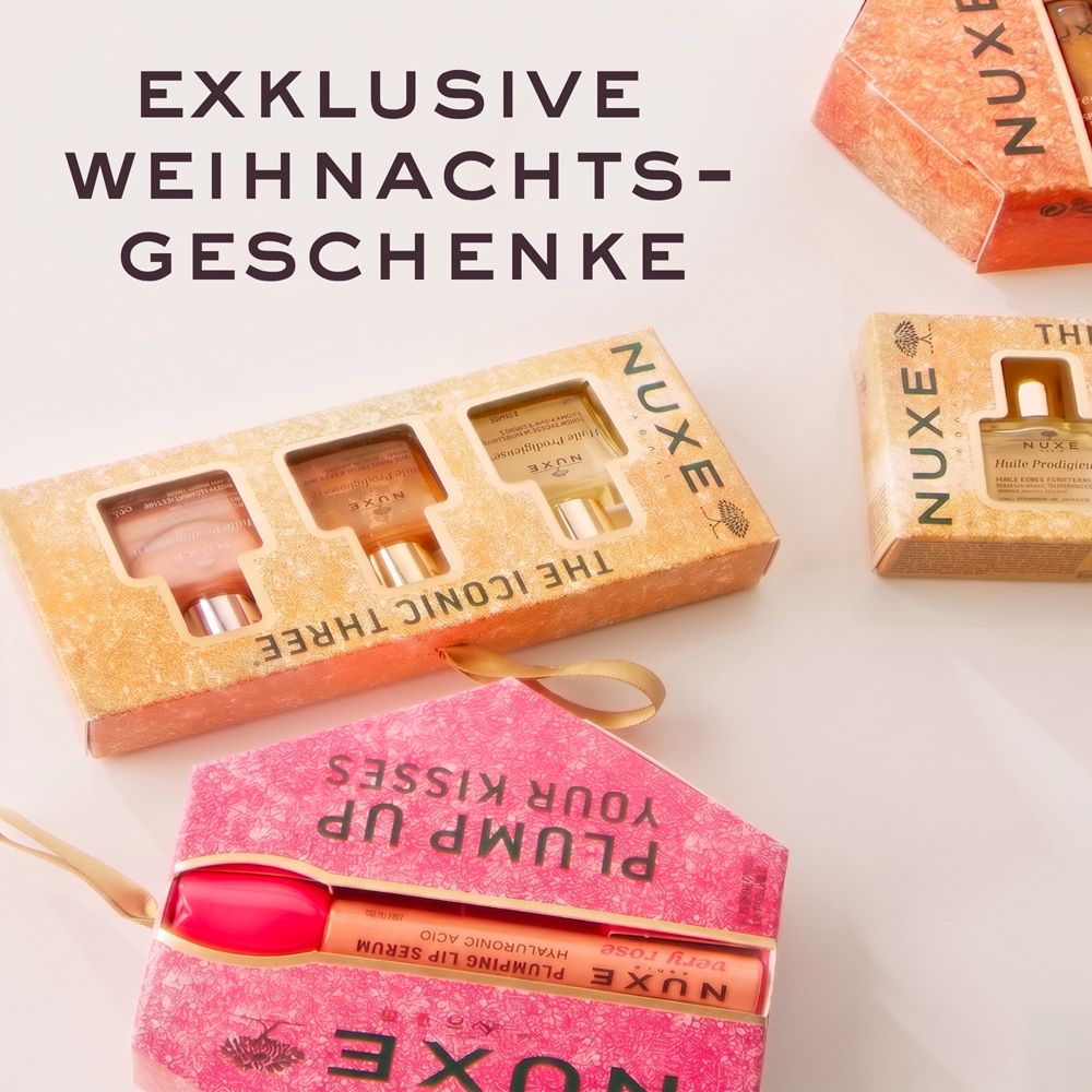 Nuxe Geschenkset mit drei Parfümflaschen und Lippenpflege.