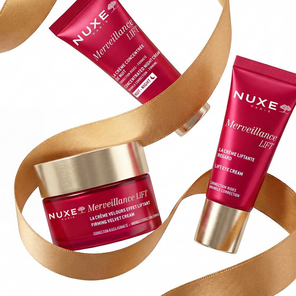 Nuxe Merveillance Lift Tiegel und zwei Tuben, umgeben von einem Band.