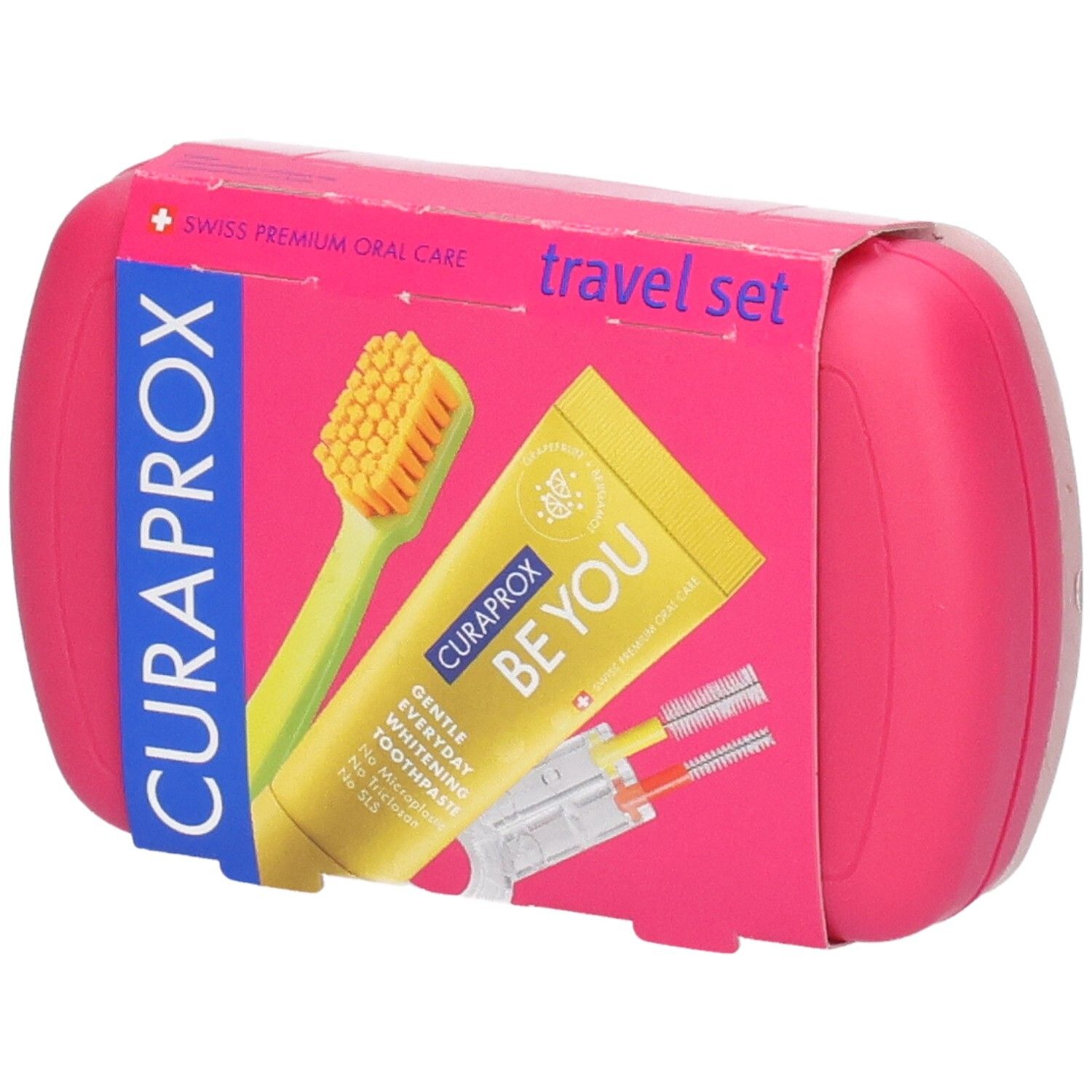 Curaprox Reise-Set mit Zahnbürste, Zahnpasta und Interdentalbürsten in einer pinken Hülle.