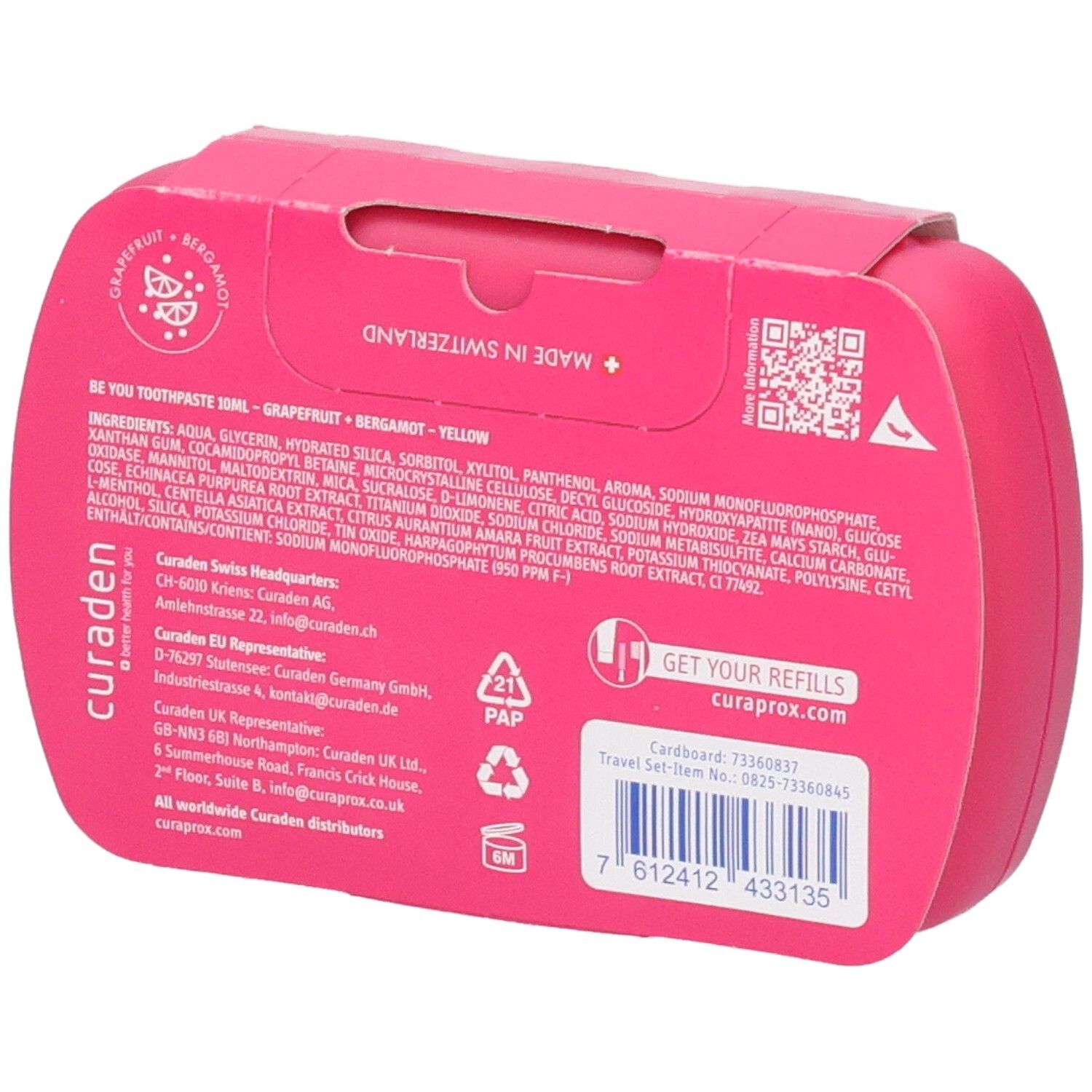 Eine pinke Curaprox Reisebox mit Produktinformationen und Inhaltsstoffen.