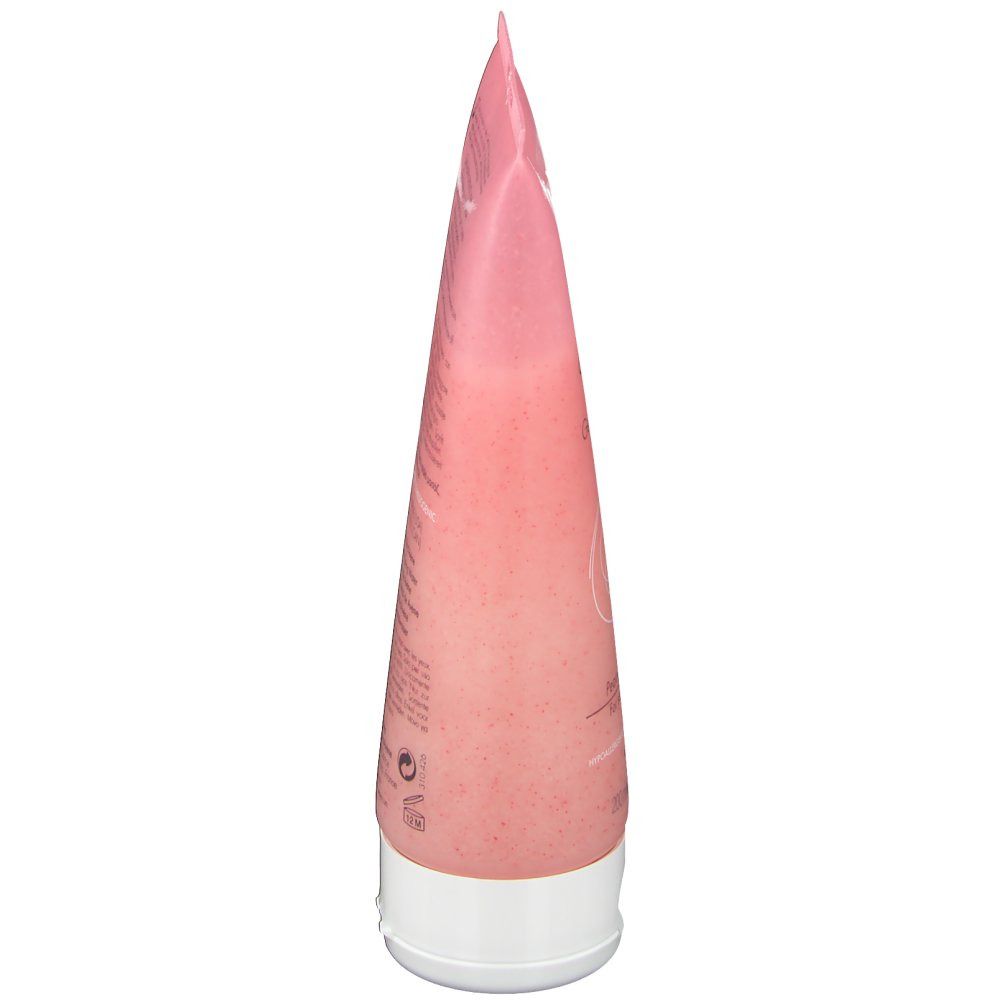Seitenansicht einer rosa Tube mit weißem Verschluss. Text nicht lesbar.