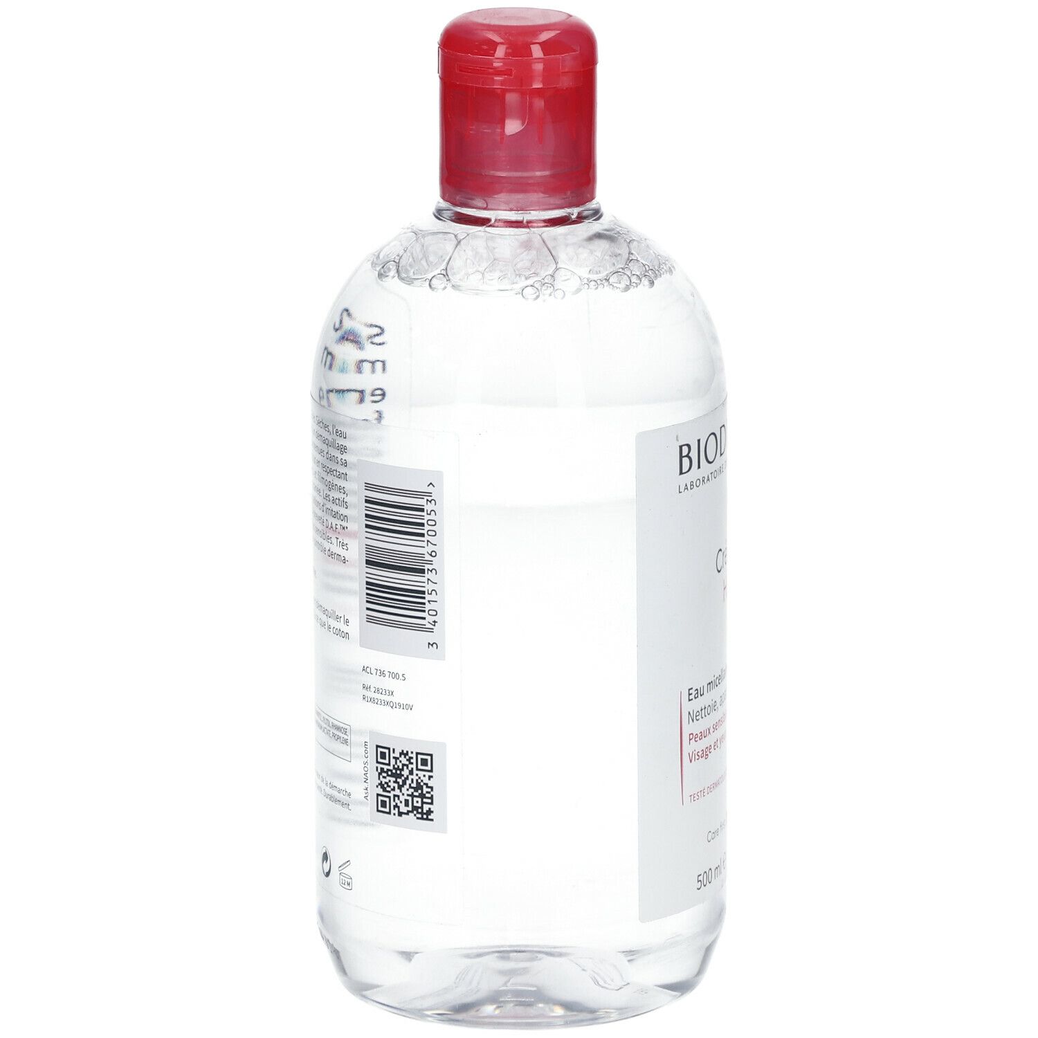 Rückseite einer transparenten Flasche mit rotem Deckel. Etikett mit Barcode und Text. BIODERMA Créaline H2O TS.