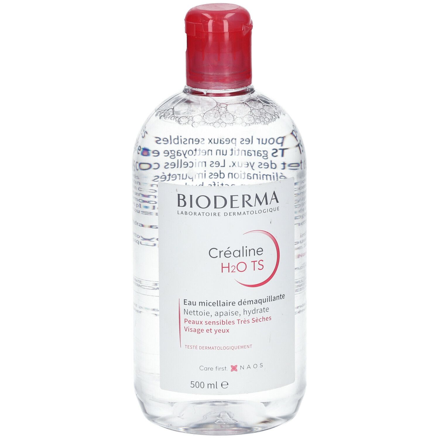 Klare Flasche mit rotem Deckel. Aufschrift: BIODERMA, Créaline H2O TS. Mizellenwasser für empfindliche Haut. 500 ml.