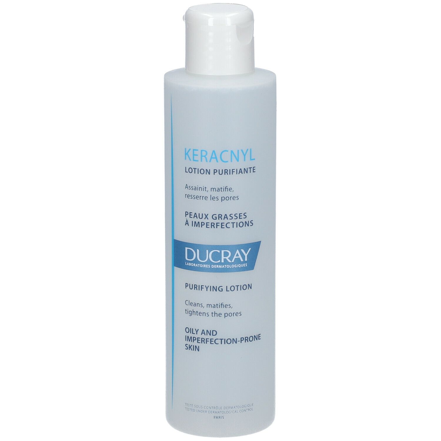 Lotion nettoyante Ducray KERACNYL. Bouteille blanche avec étiquette bleue. Nom du produit et caractéristiques imprimés.