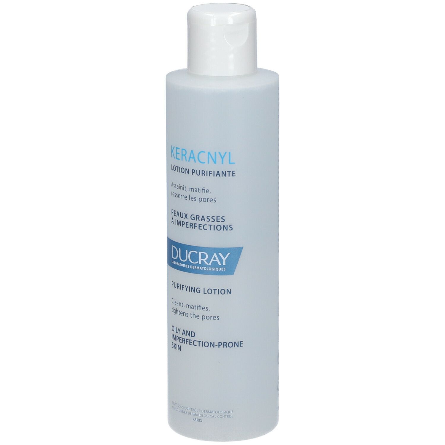 Lotion nettoyante Ducray KERACNYL. Bouteille blanche avec étiquette bleue. Nom du produit et caractéristiques imprimés.