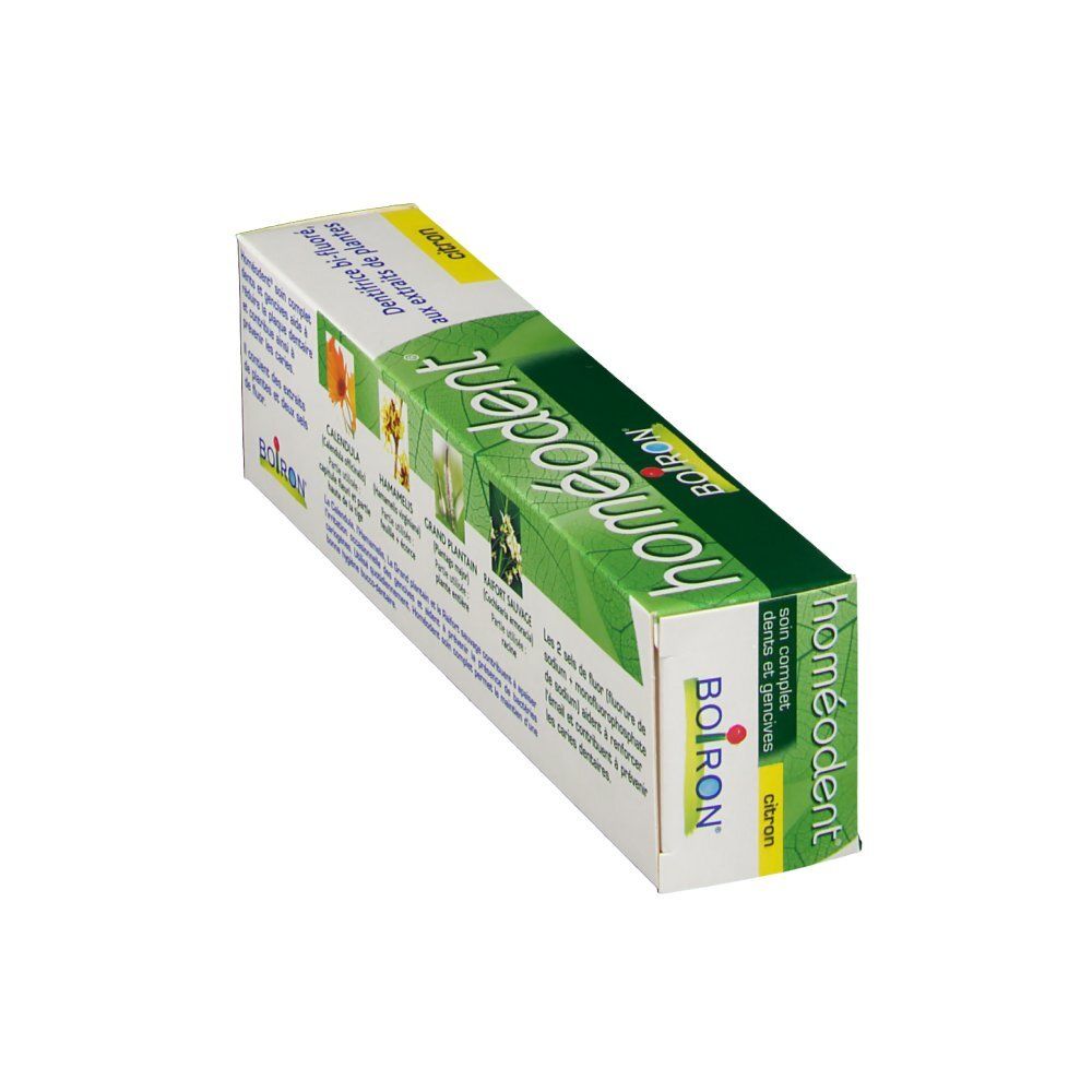 Emballage de dentifrice en biais. Vert et blanc. Inscription: homéodent. Impression: soin complet dents et gencives. Citron.