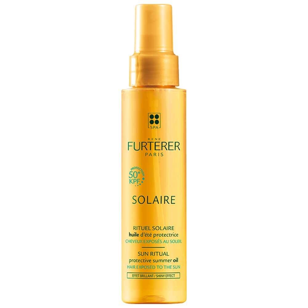 Flacon jaune avec vaporisateur. Inscription: Rene Furterer, Solaire, 50 KPF. Texte: Sun Ritual, huile d'été protectrice, cheveux exposés au soleil.