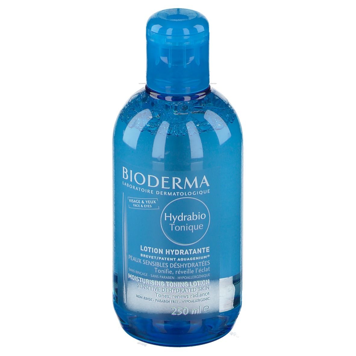 Blau-transparente Flasche mit blauem Deckel. Aufschrift: BIODERMA, Hydrabio Tonique, Lotion Hydratante. Für Gesicht & Augen.