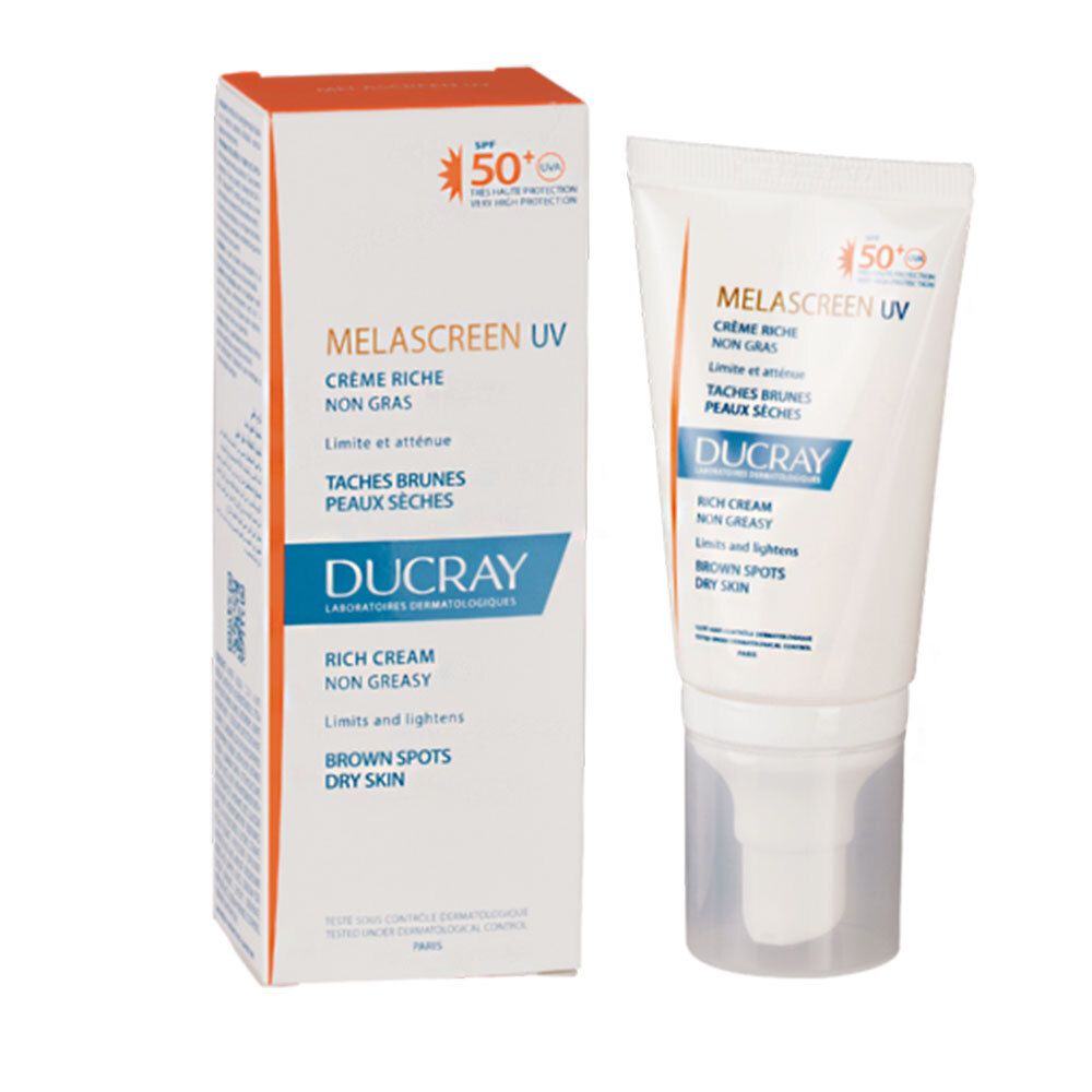 Ducray Melascreen UV Creme und Verpackung. Text: Creme Riche, Non Gras, Taches Brunes, Peaux Seches. LSF 50+. Weiße Box.