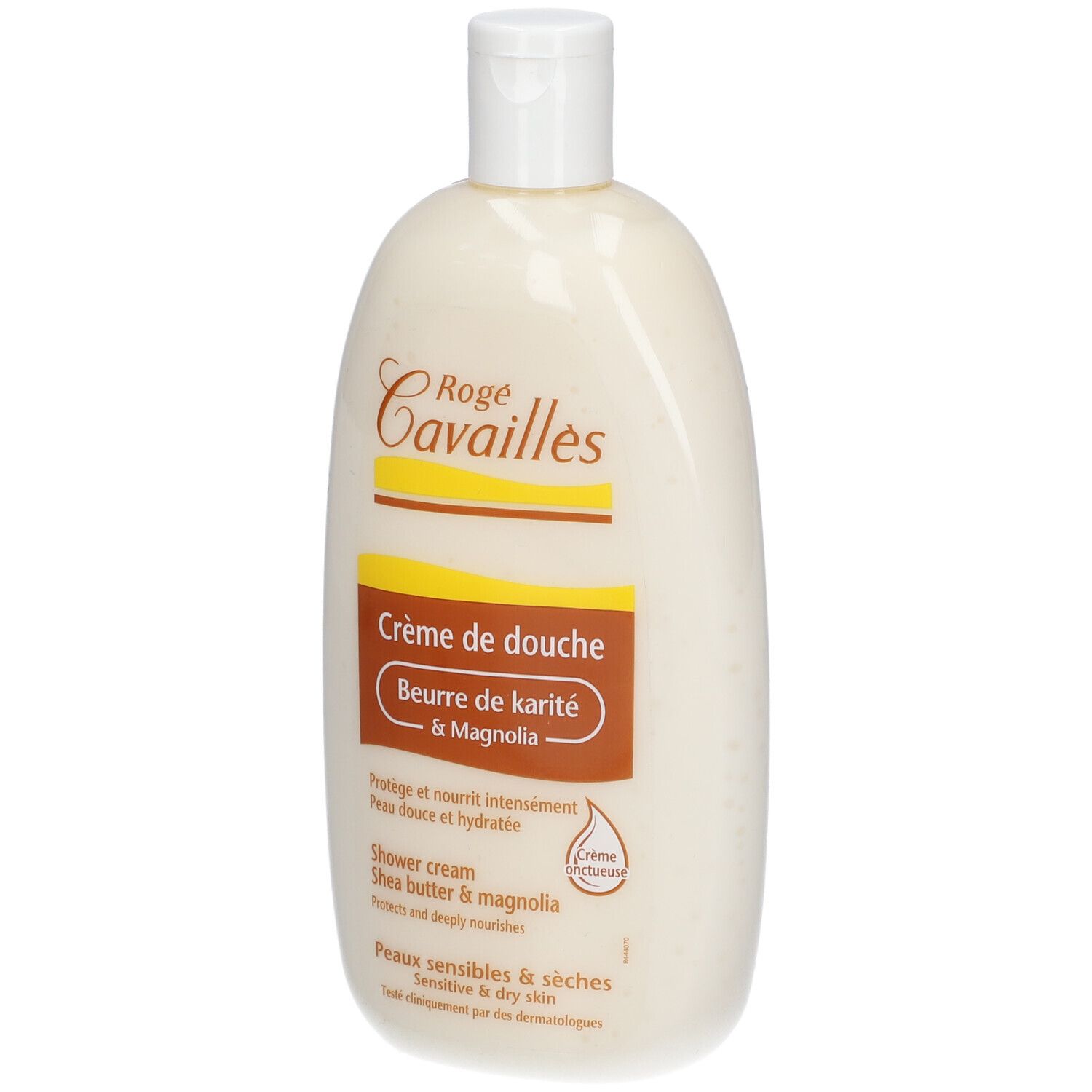 Creme-Dusche-Flasche. Rogé Cavaillès-Logo. Text: Crème de douche, Beurre de karité & Magnolia. Für empfindliche Haut. Weiße Flasche mit Klappverschluss.