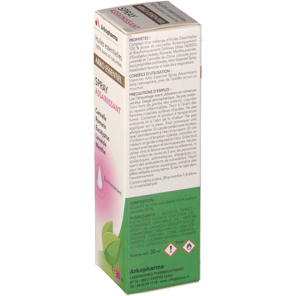 Boîte en carton. Logo "Arko Essentiel Spray Assainissant". Ingrédients et instructions d'utilisation. Éléments verts et roses.