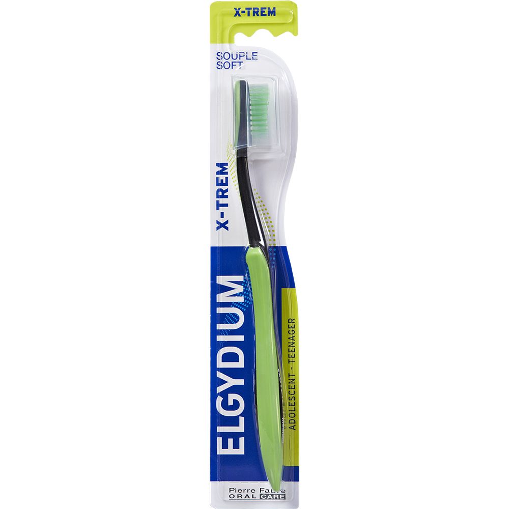 Brosse à dents Elgydium X-Trem, souple, manche vert et tête de brosse noire.
